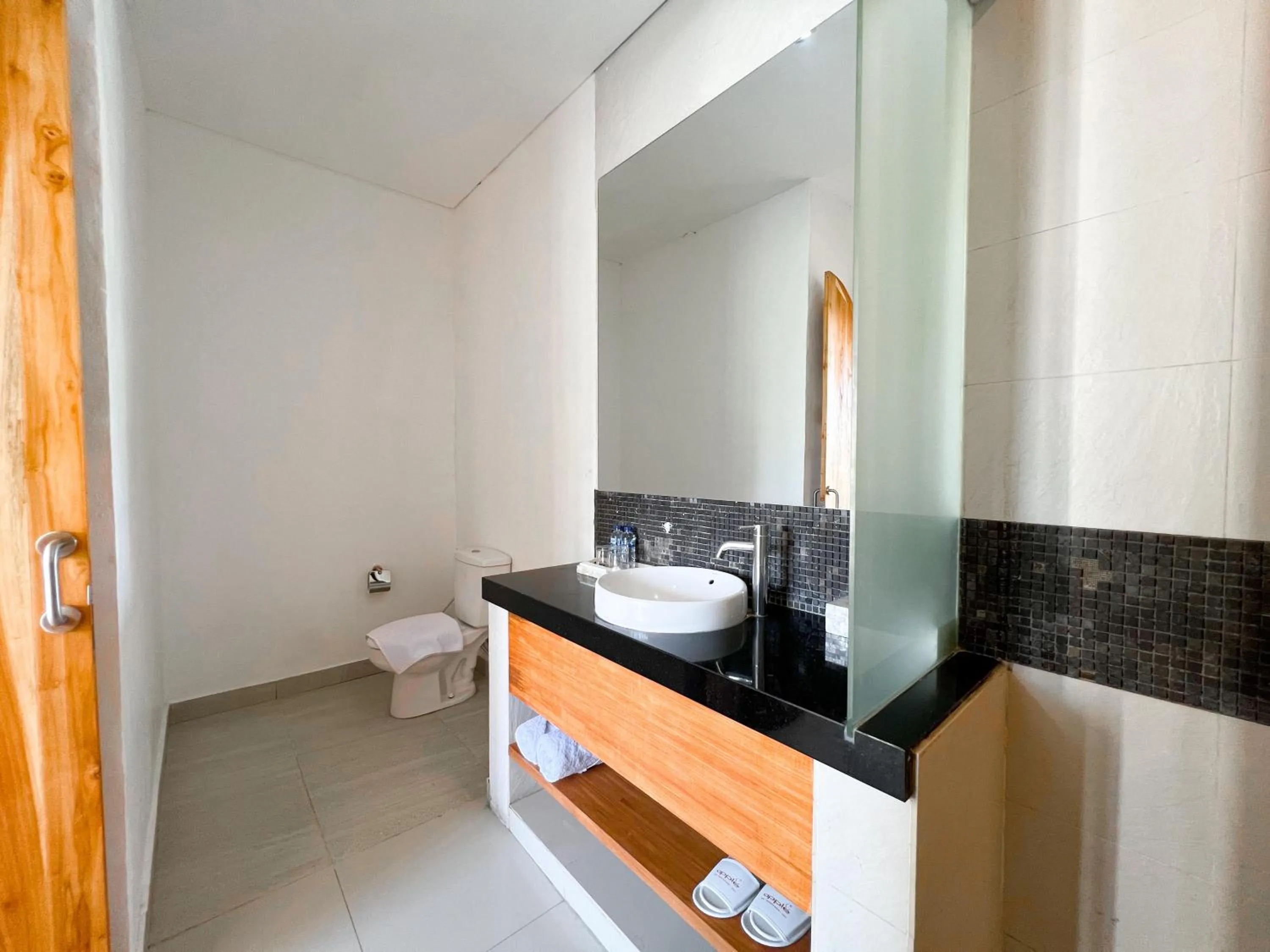 Toilet in Apple Villas & Apartments