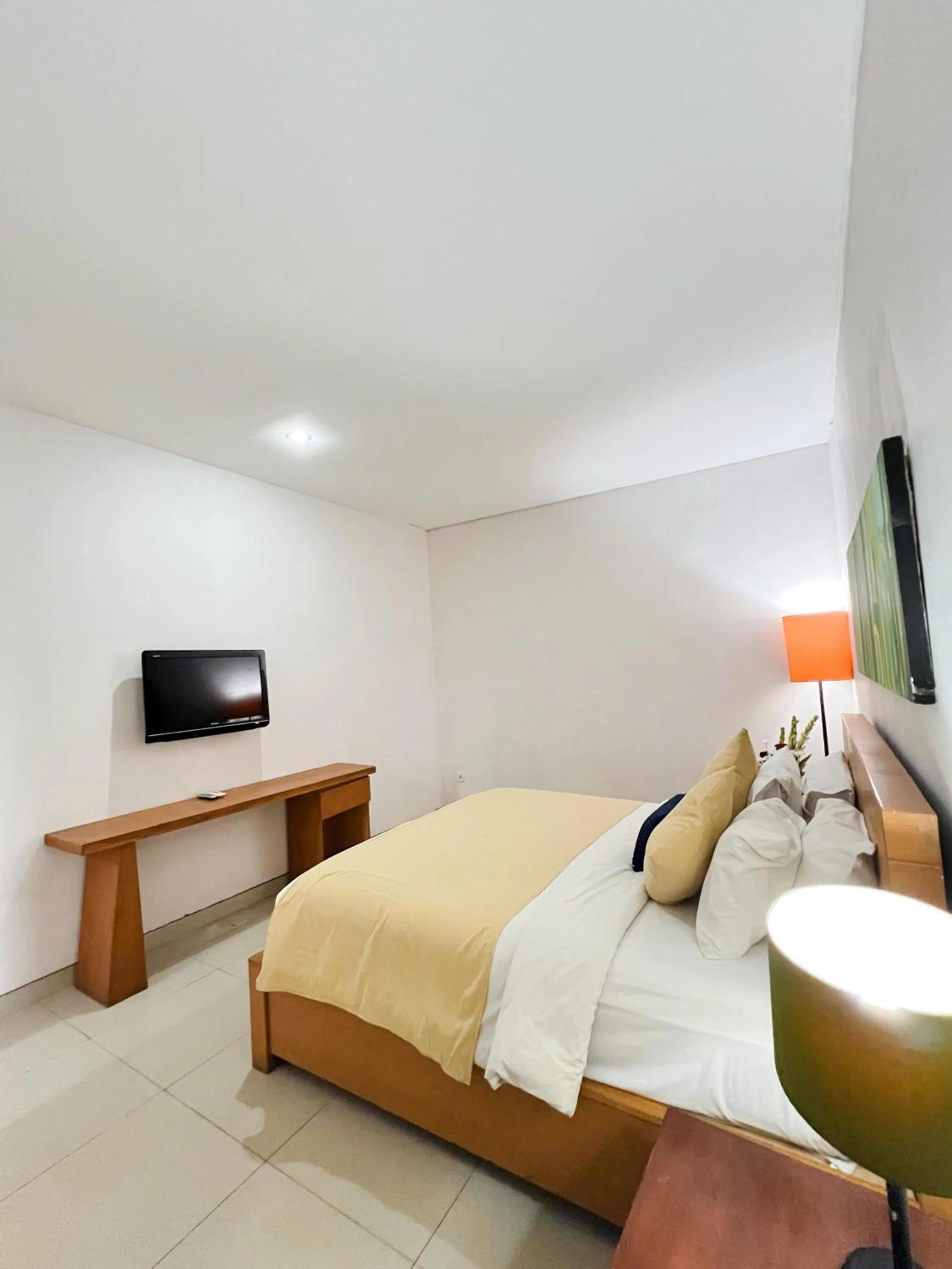 Bed in Apple Villas & Apartments