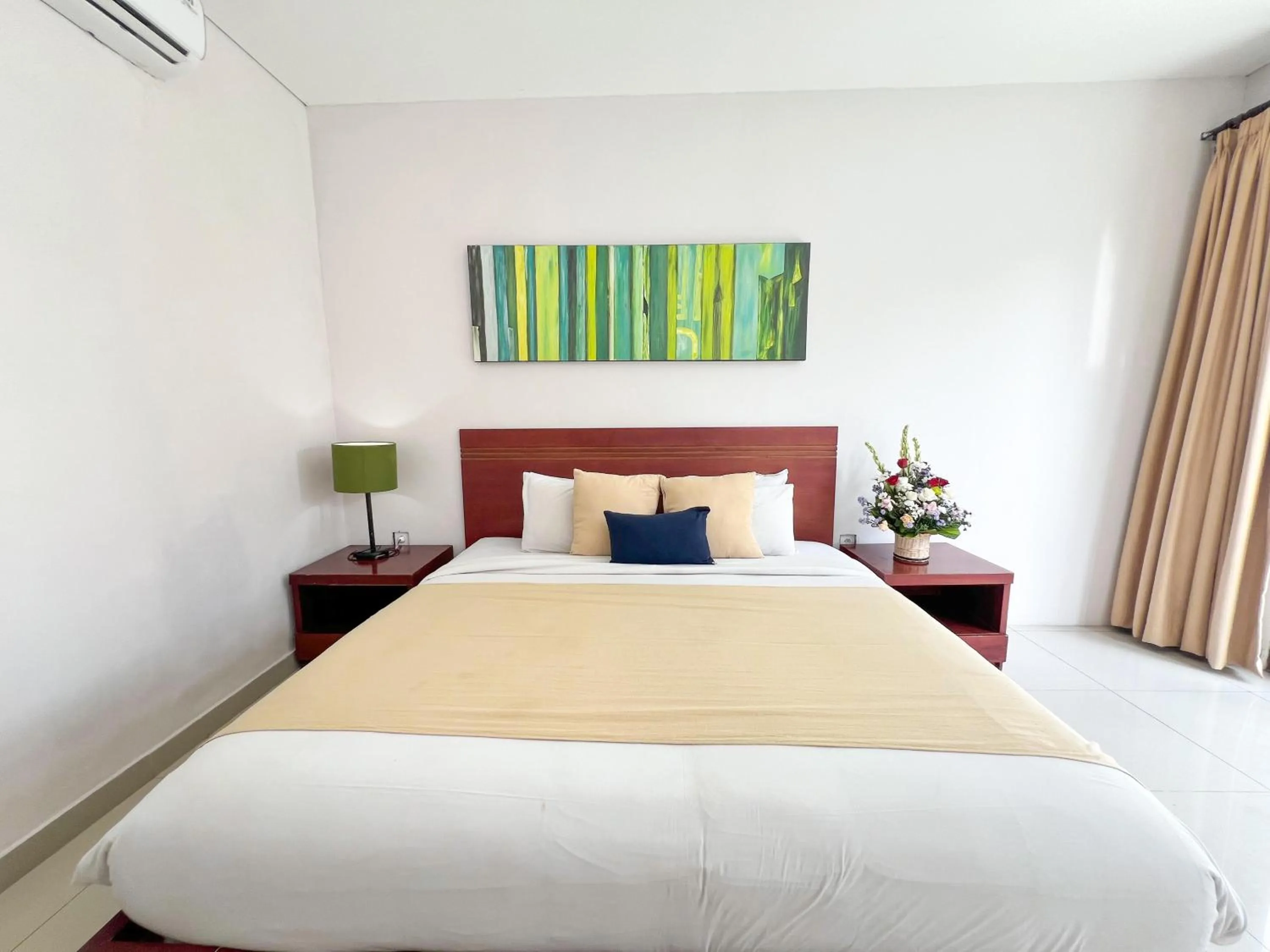 Bed in Apple Villas & Apartments