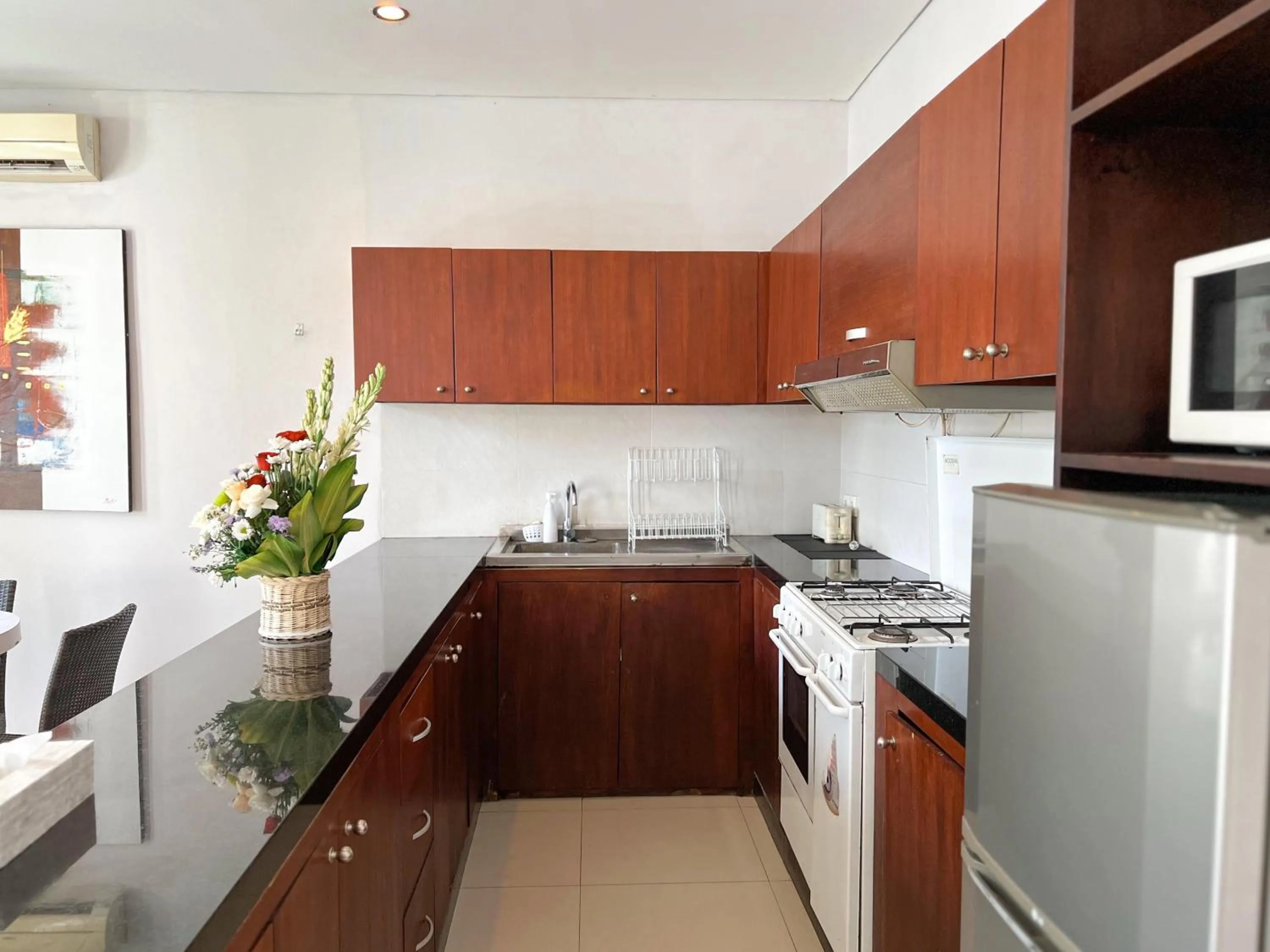 Kitchen or kitchenette in Apple Villas & Apartments