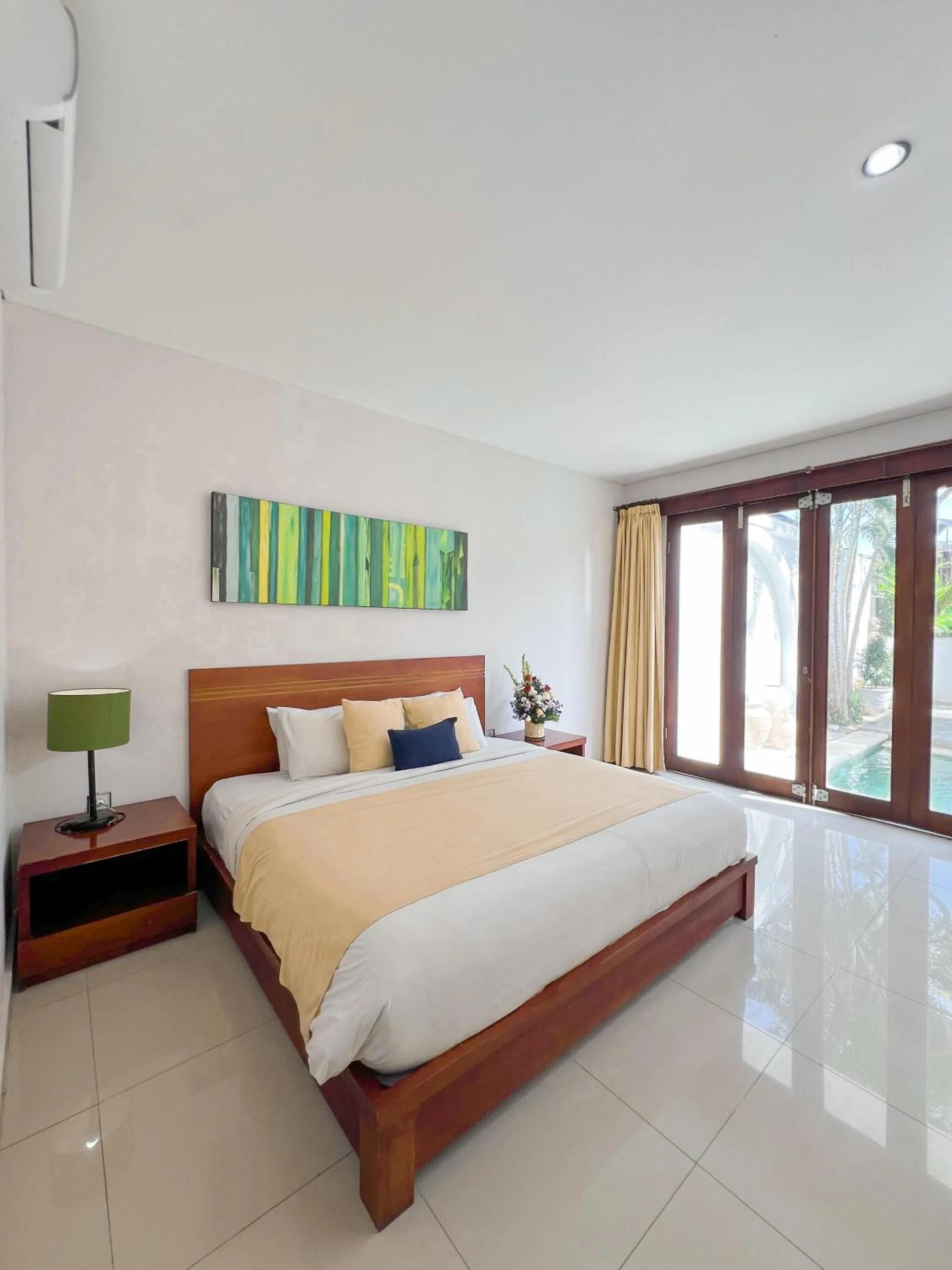 Bed in Apple Villas & Apartments