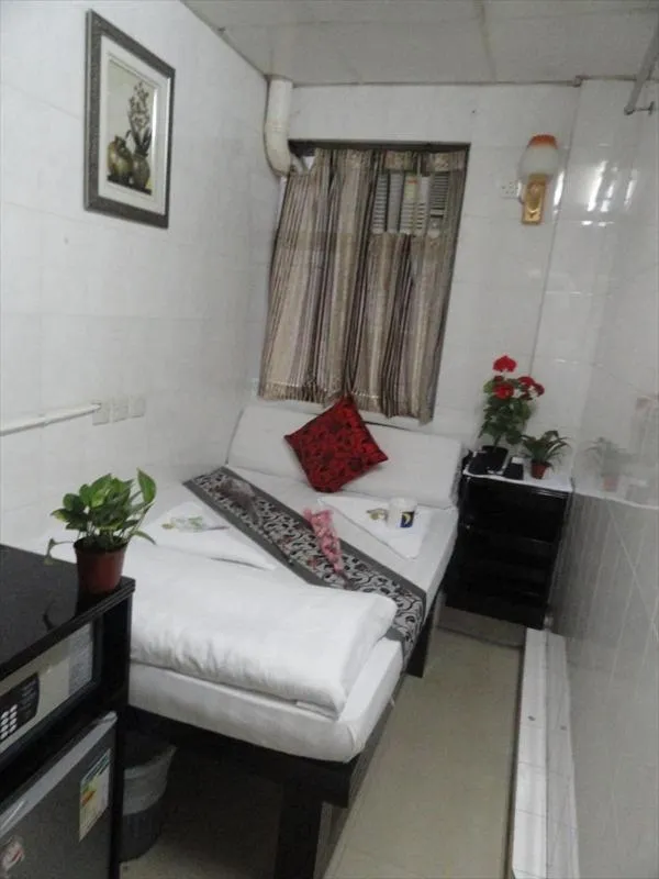 Photo of the whole room, Bed in City Guest House