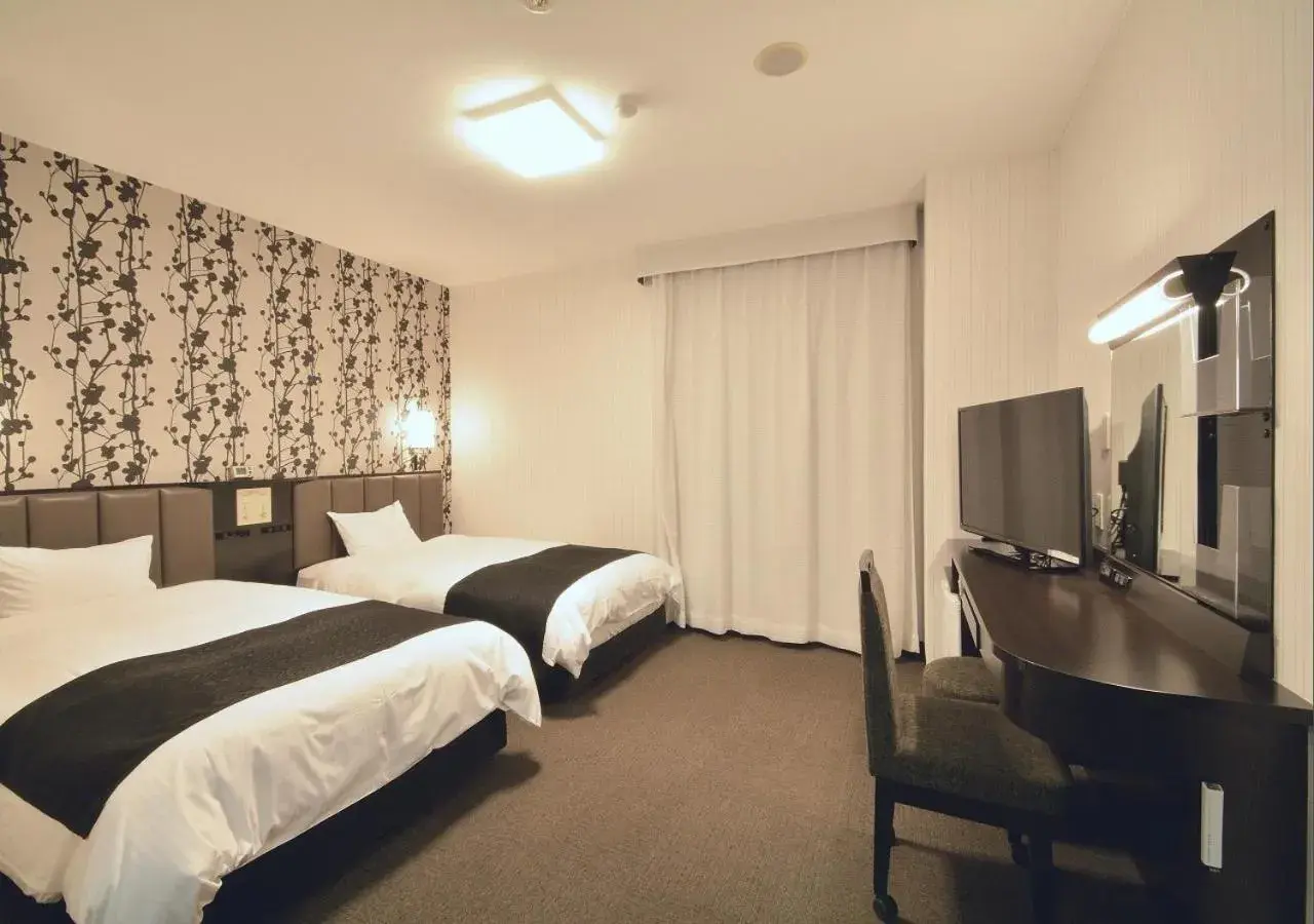 Photo of the whole room, Bed in APA Hotel Kagoshima Kokubu Photo of the whole room, Bed in APA Hotel Kagoshima Kokubu