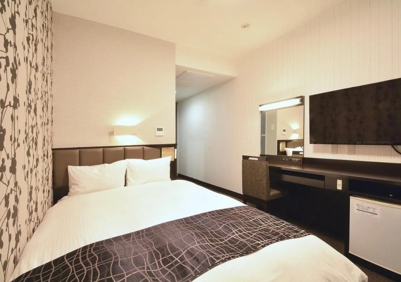 Photo of the whole room, Bed in APA Hotel Kagoshima Kokubu