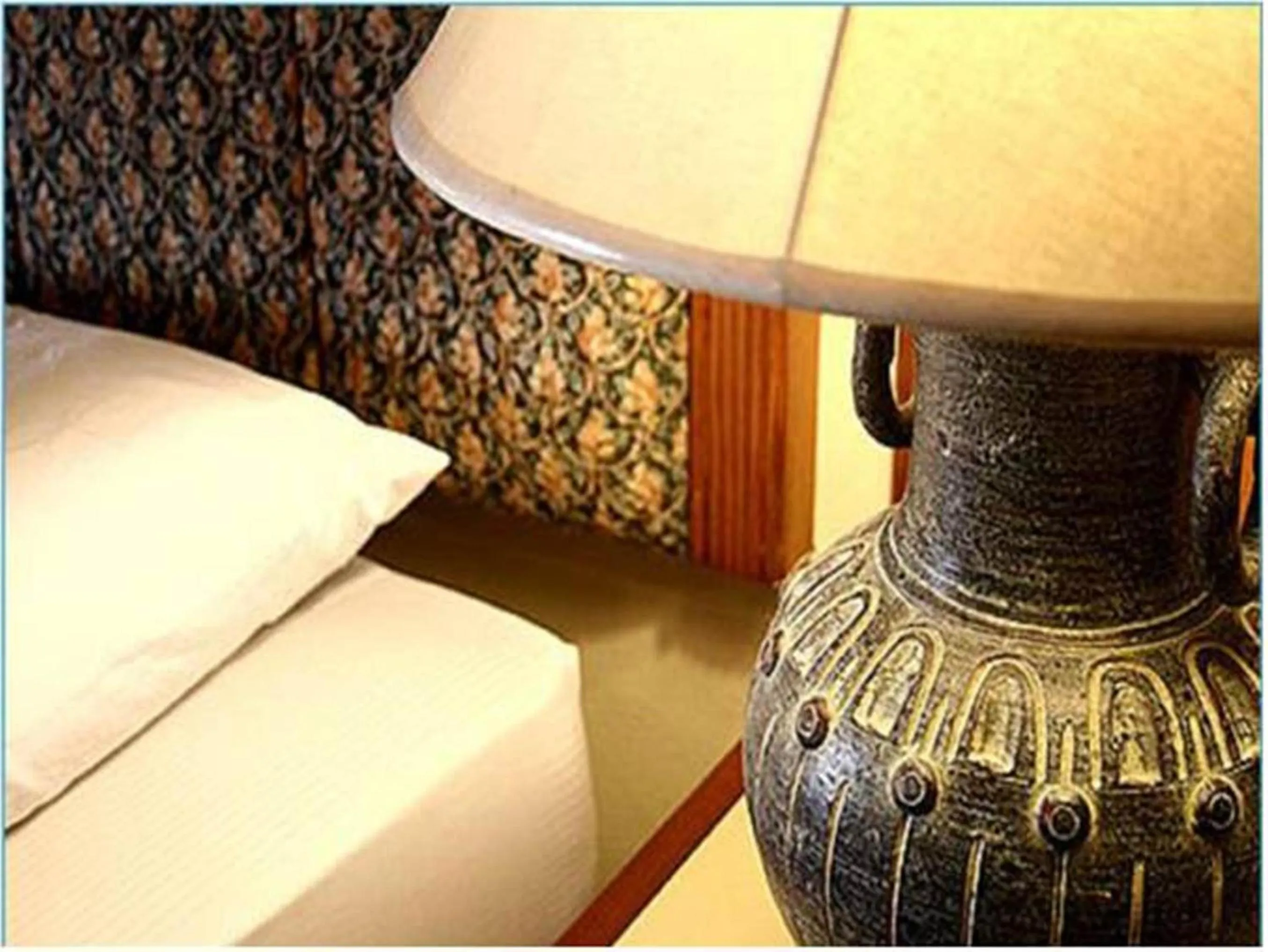 Bed in King Royal Garden Inn