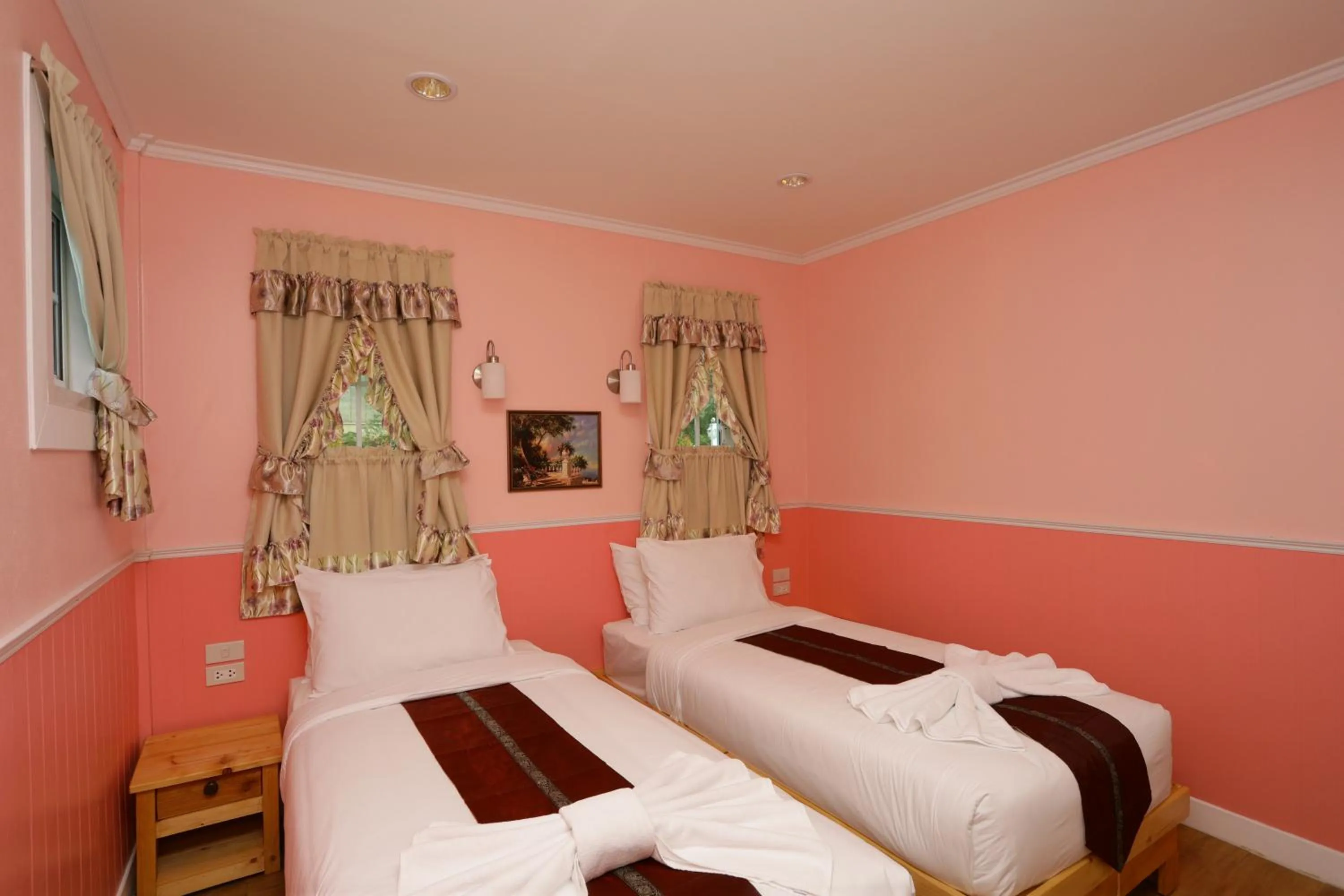 Bed in Pattaya Paradise Beach Resort