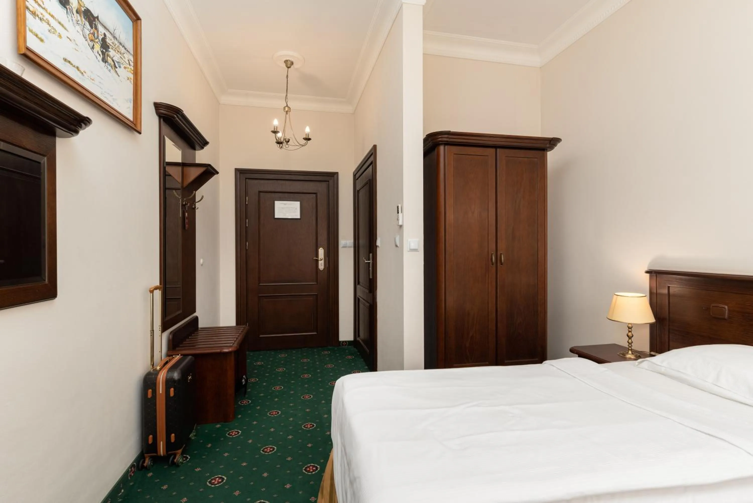 Bed in Royal Hotel Modlin