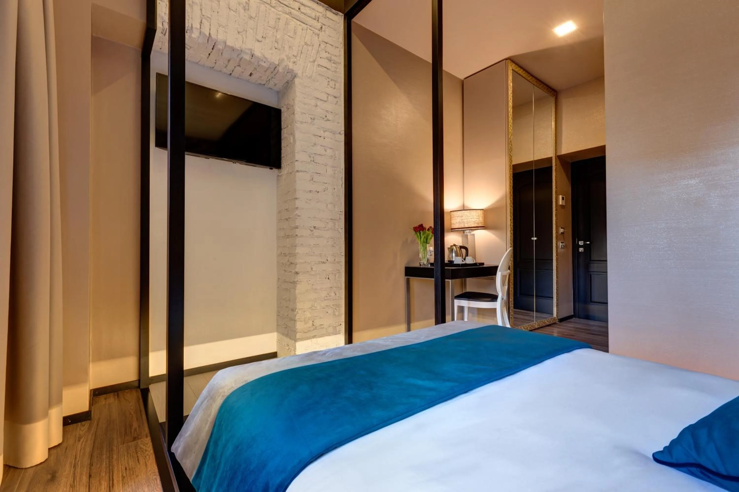 Photo of the whole room, Bed in Dharma Luxury Hotel