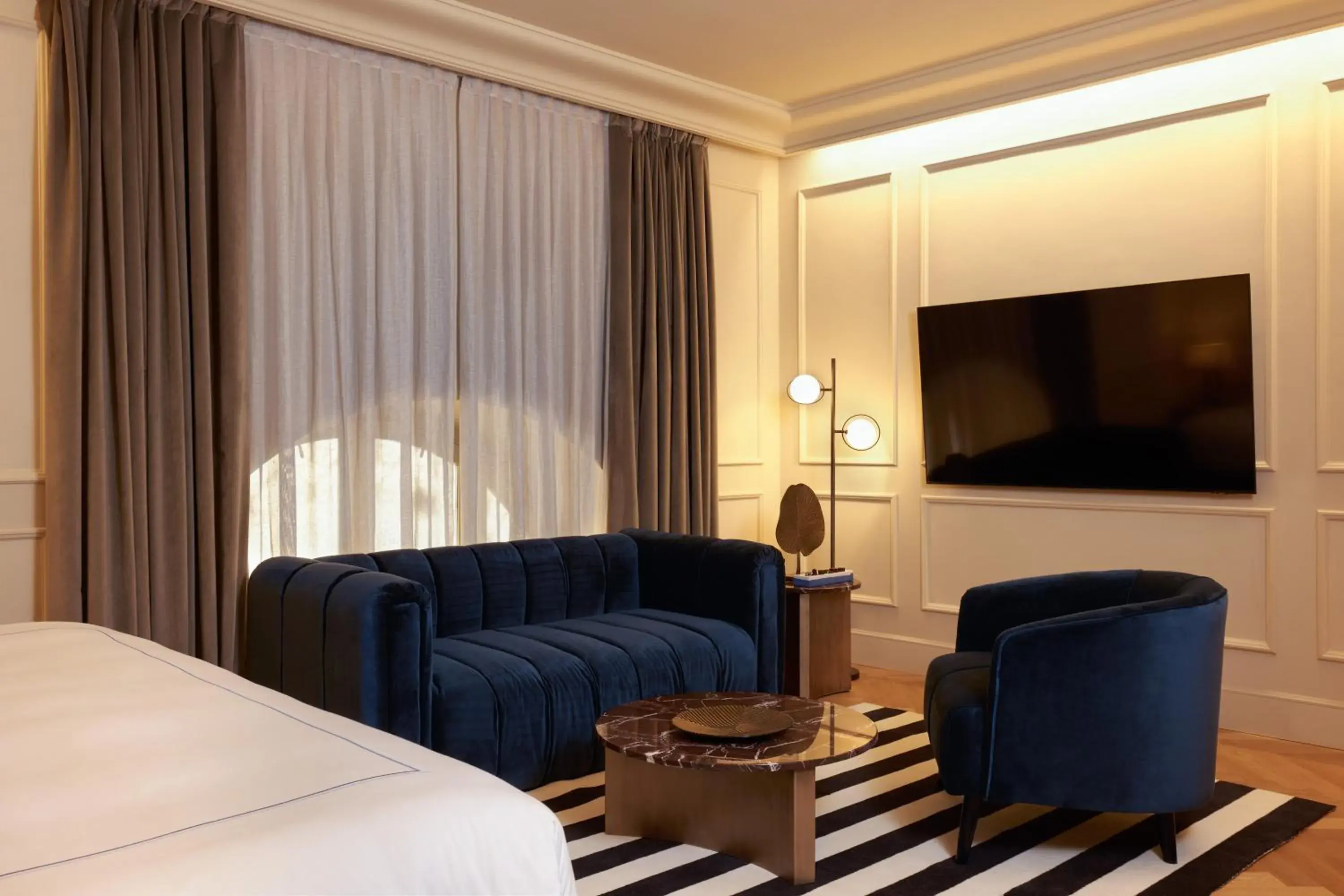 Seating area, Bed in The First Arte - Preferred Hotels & Resorts Seating area, Bed in The First Arte - Preferred Hotels & Resorts