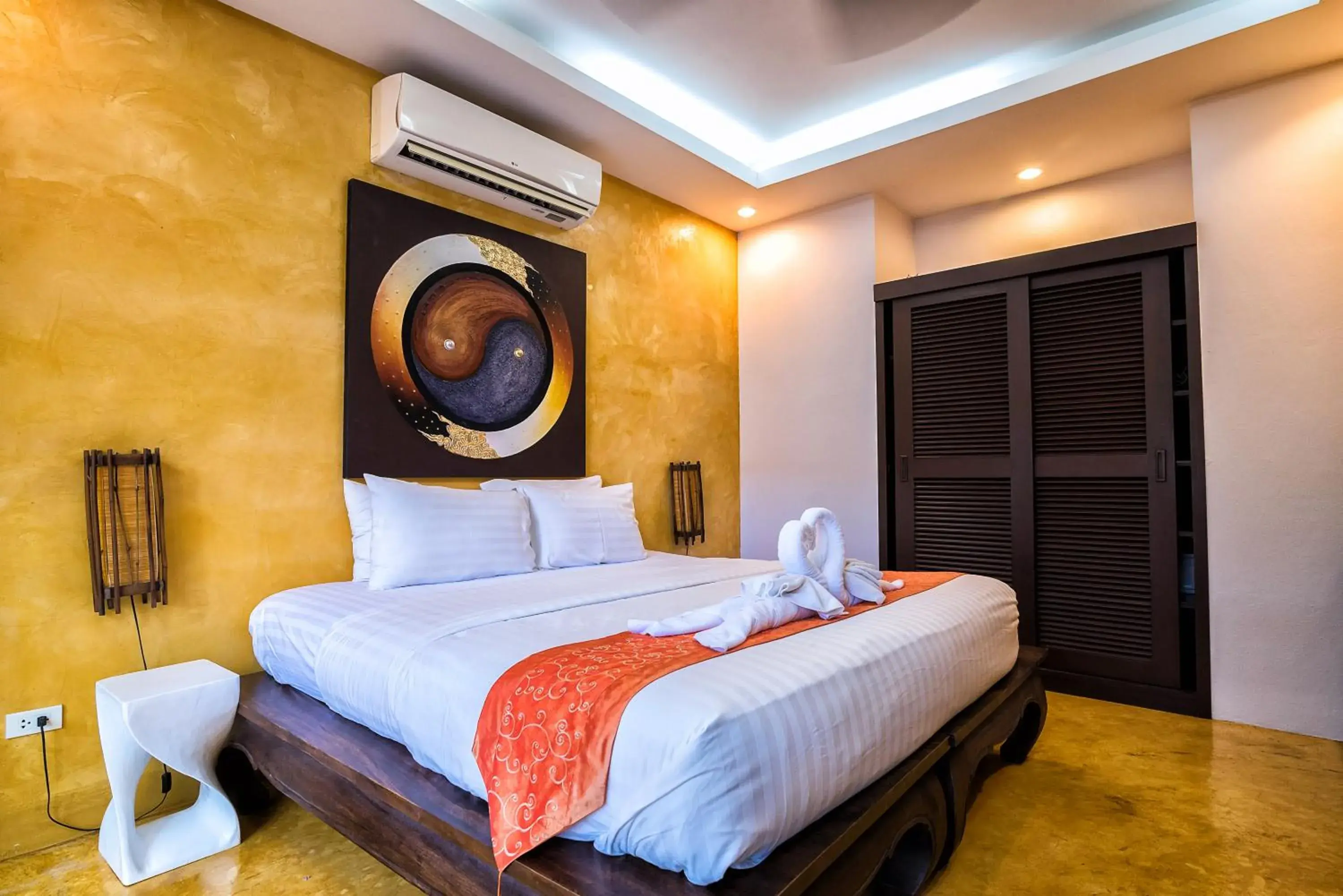 Bed in Pa Prai Villas and Suites Resort Bed in Pa Prai Villas and Suites Resort