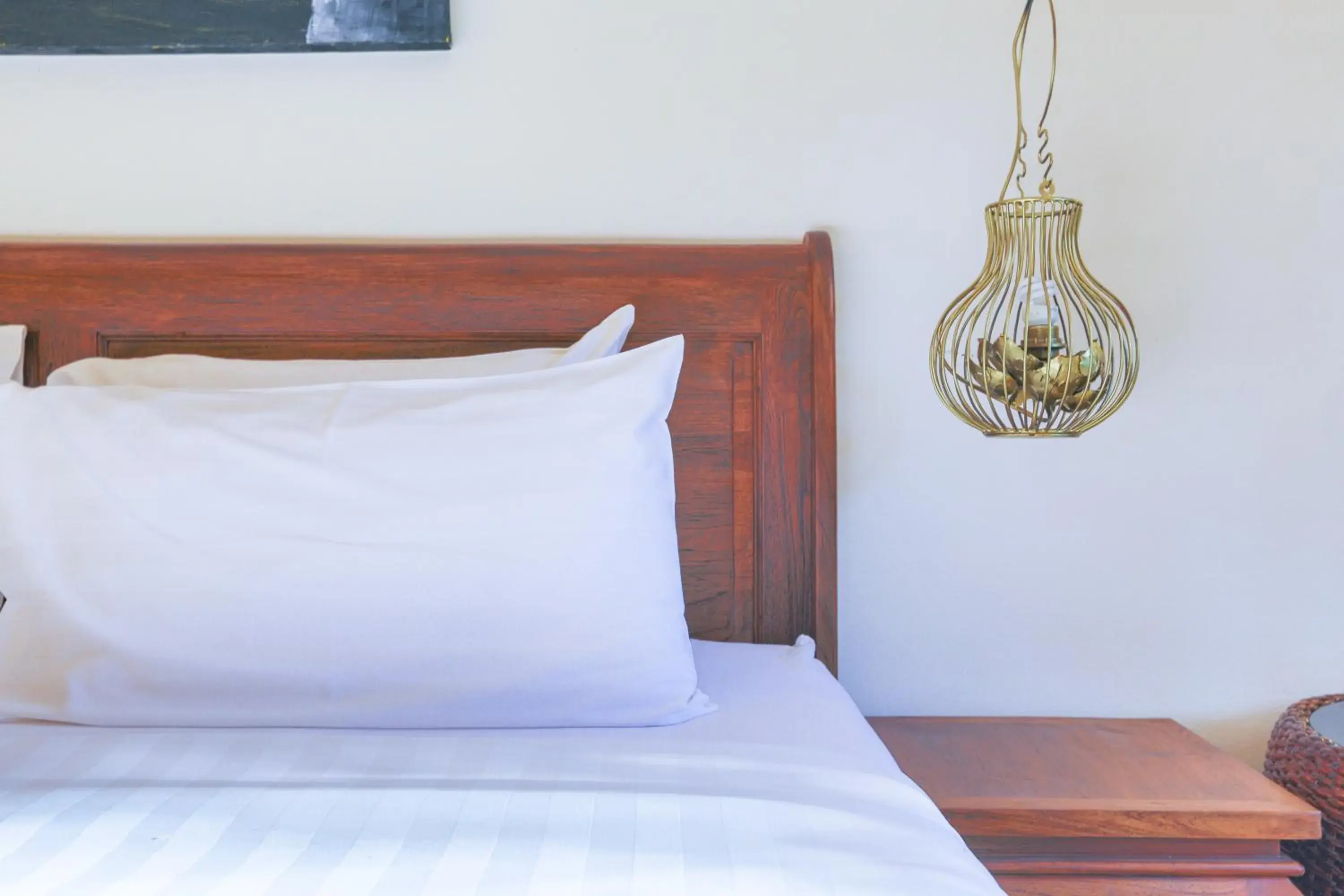 Bed in Pa Prai Villas and Suites Resort Bed in Pa Prai Villas and Suites Resort