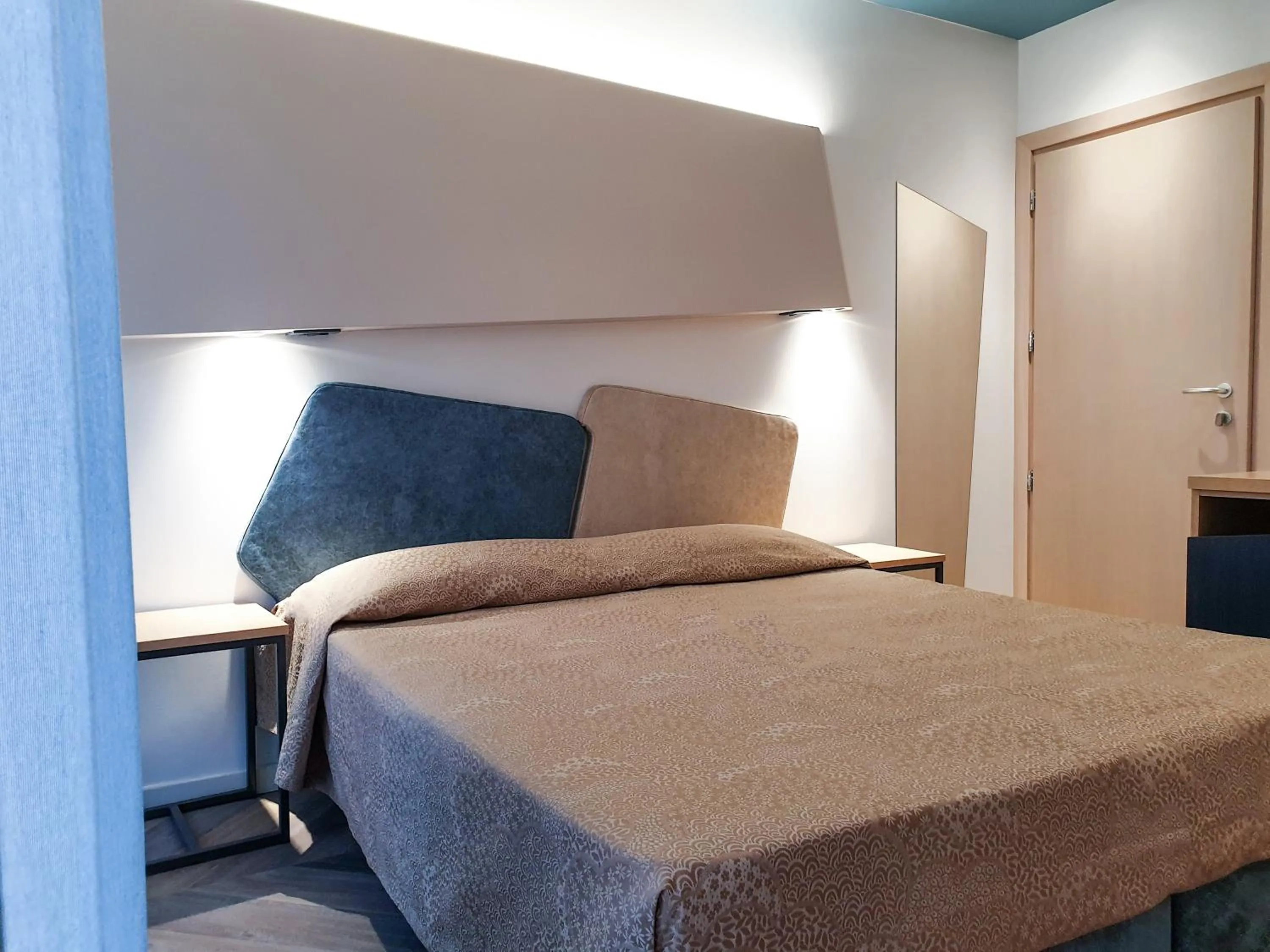 Decorative detail, Bed in Color Hotel Rimini