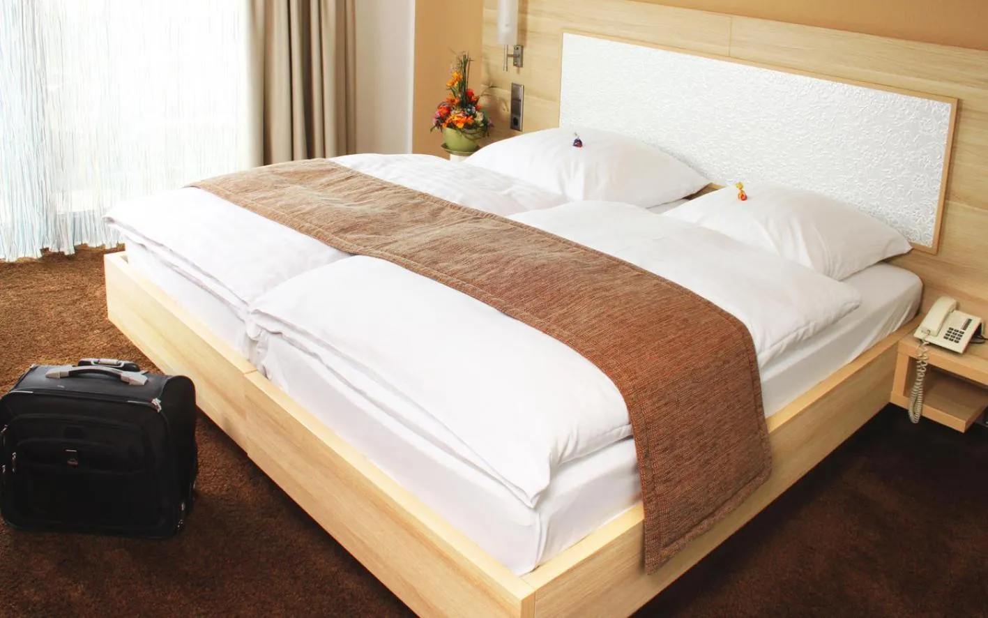 Bed in Hotel Schützenhof