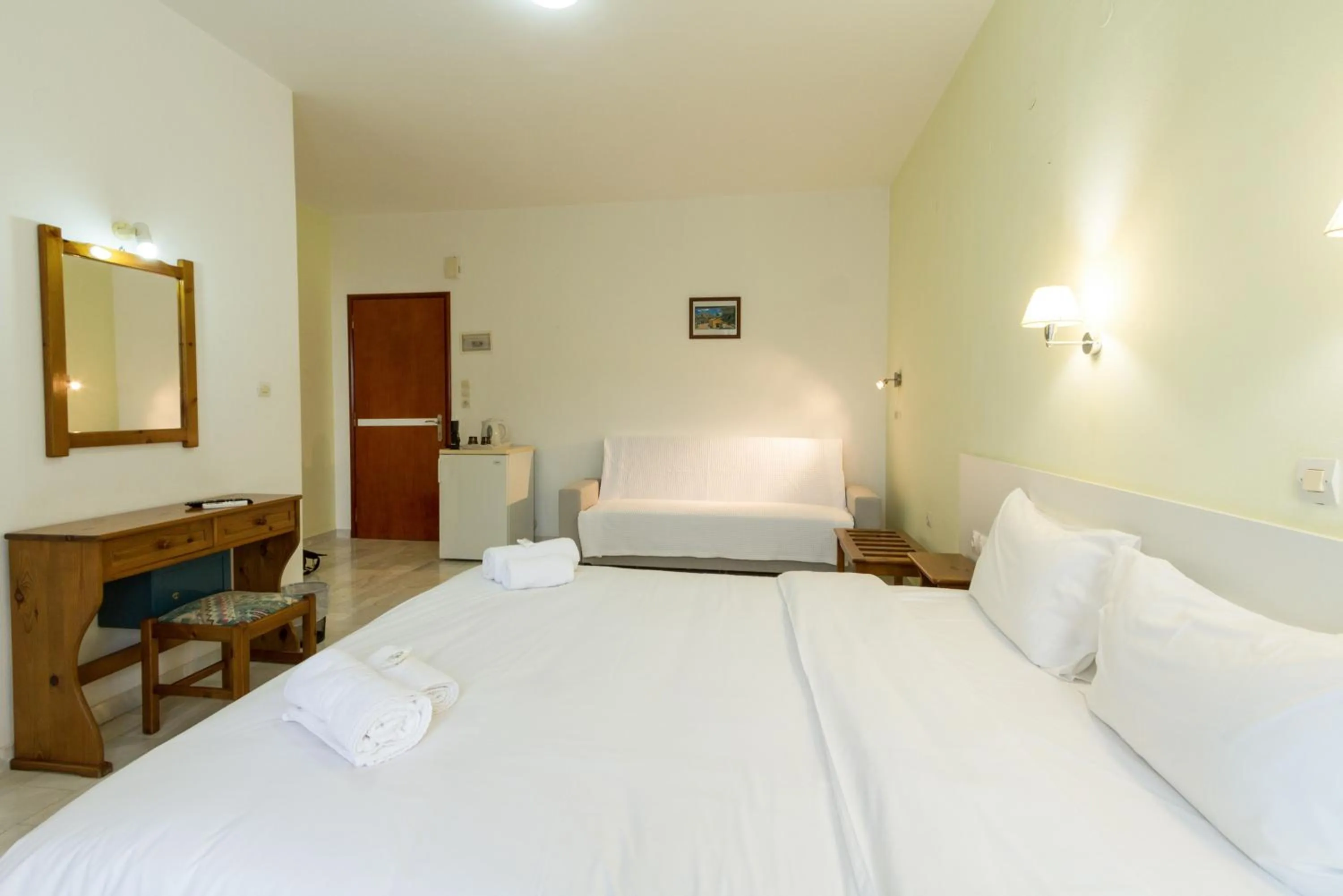 Bedroom in Revekka Rooms