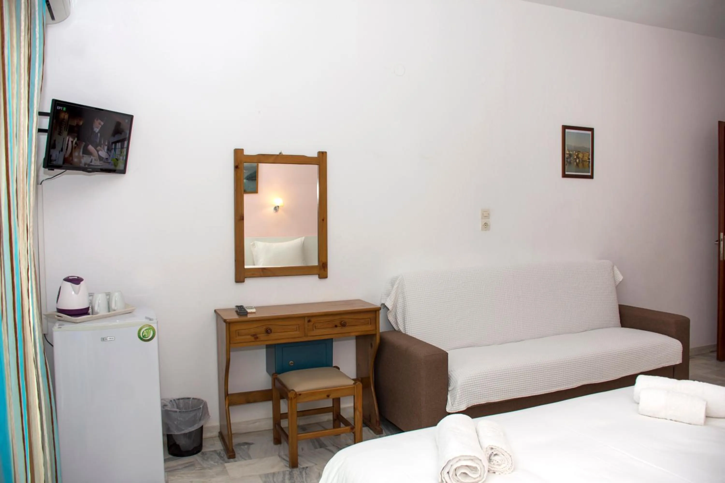 Bedroom in Revekka Rooms