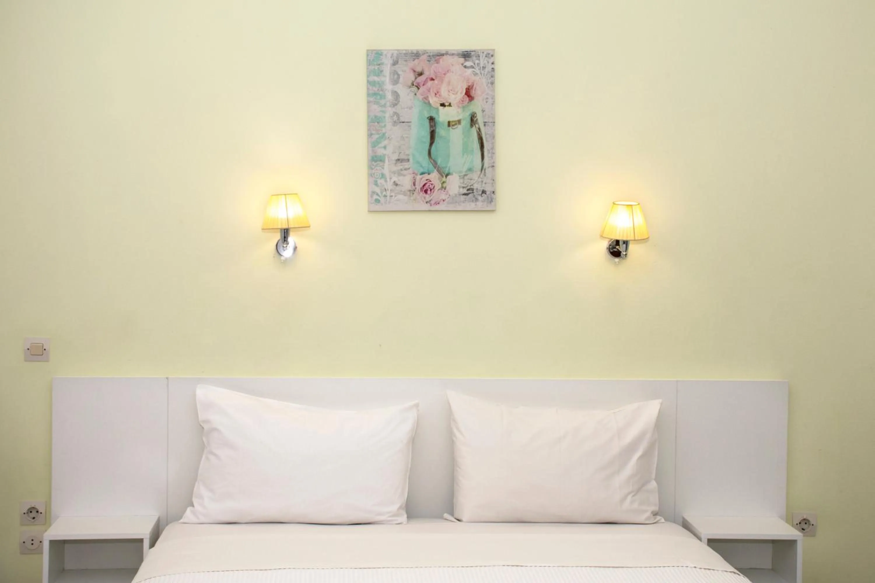 Bed in Revekka Rooms