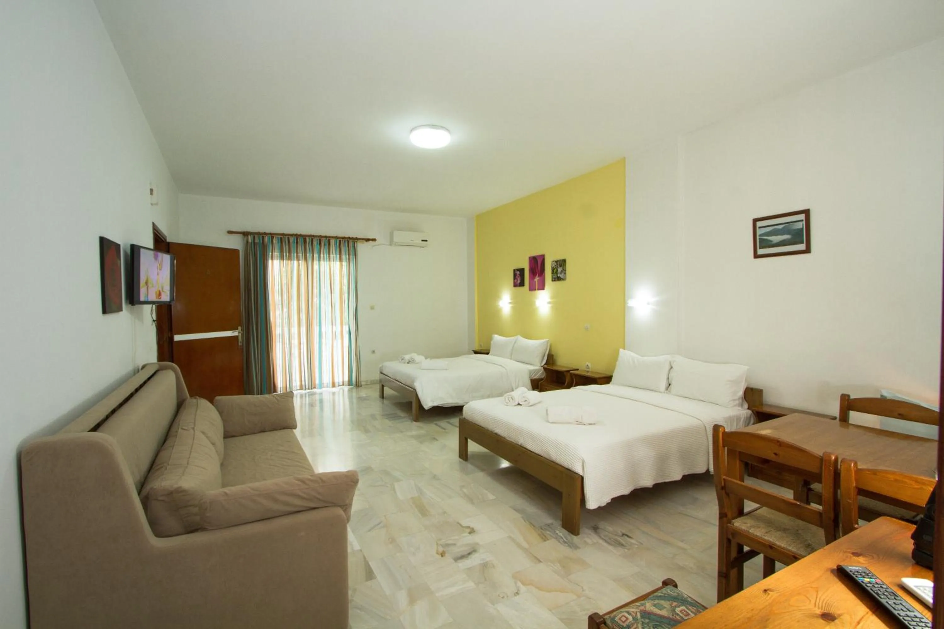 Bedroom in Revekka Rooms