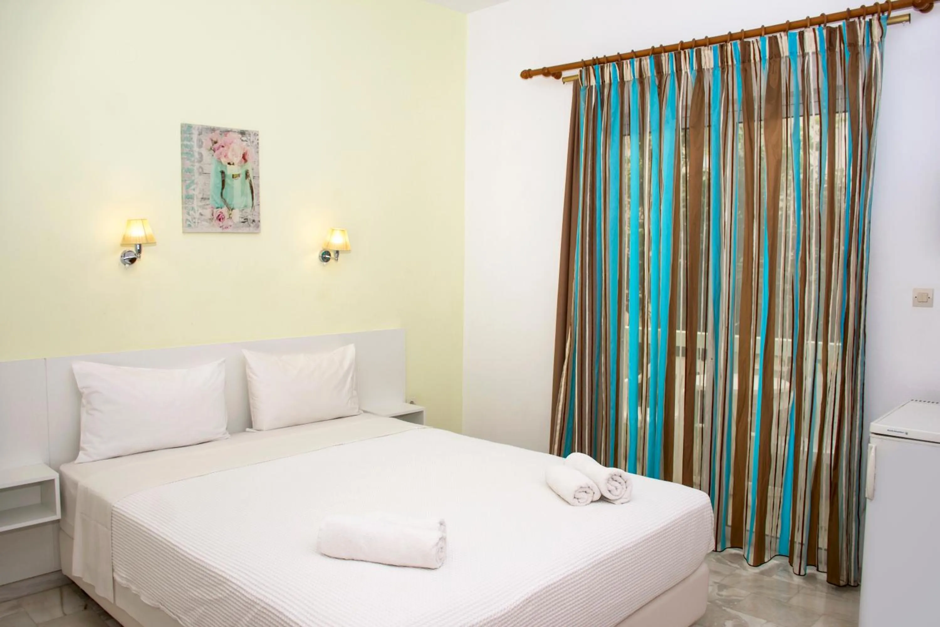 Bed in Revekka Rooms