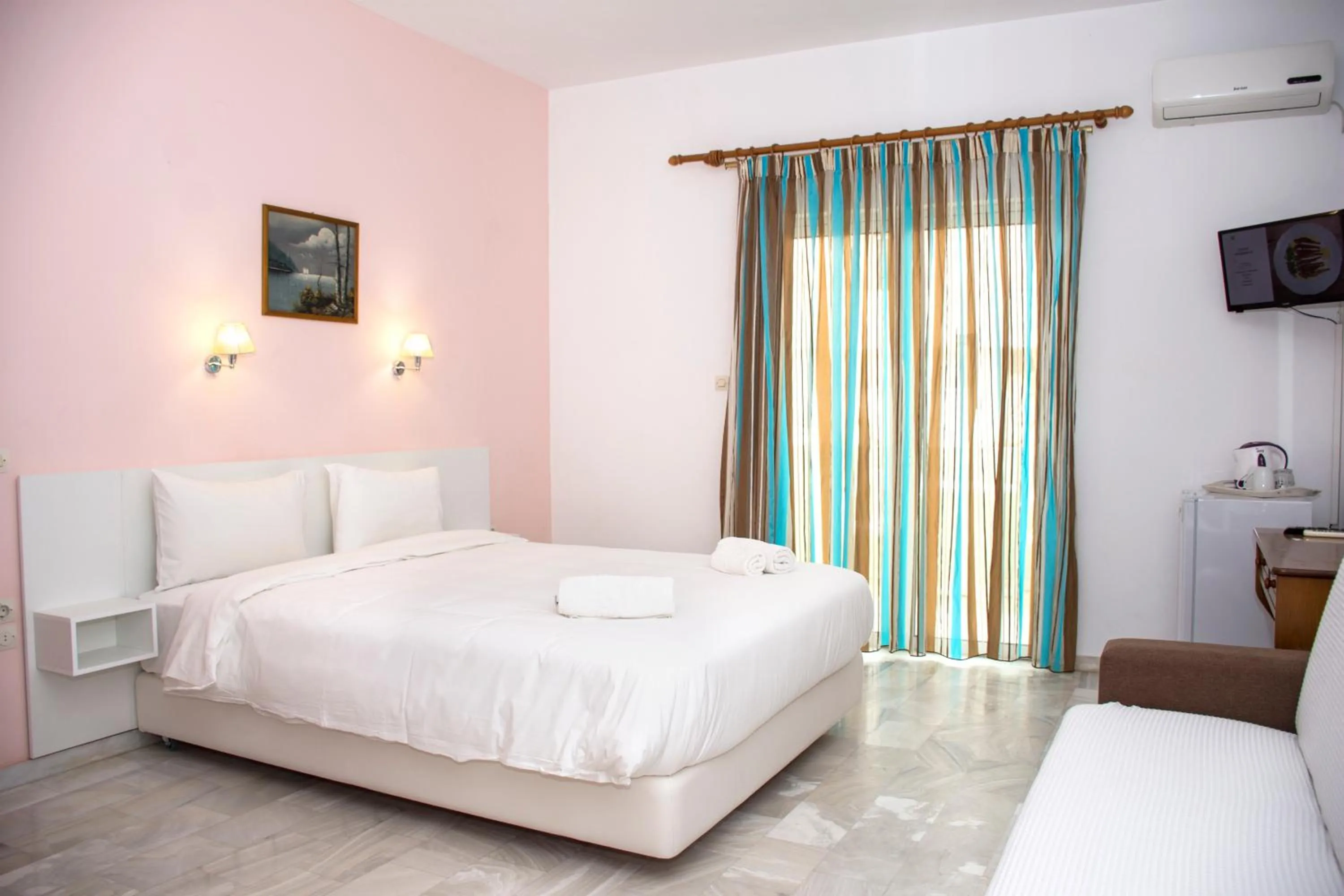 Bed in Revekka Rooms