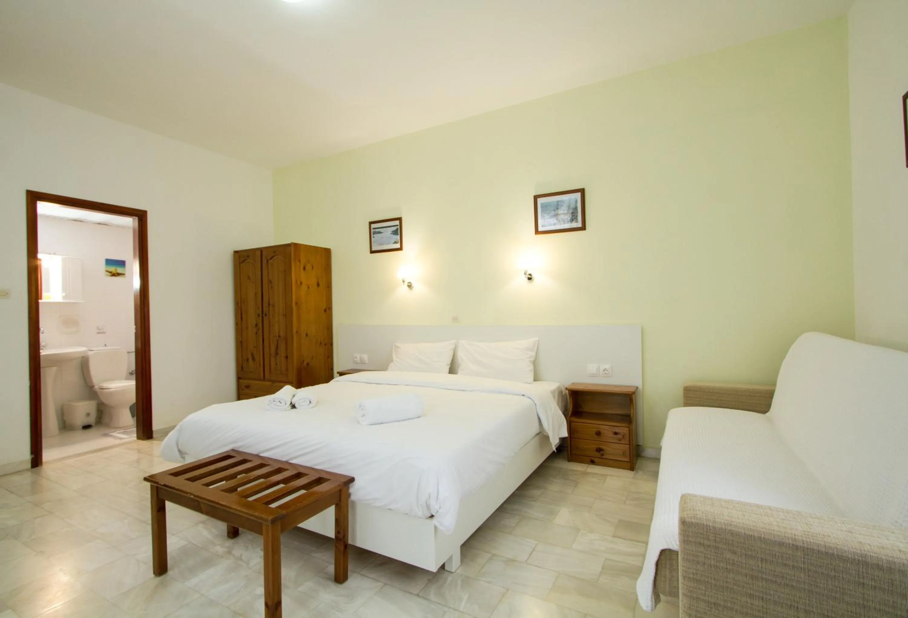 Bedroom in Revekka Rooms