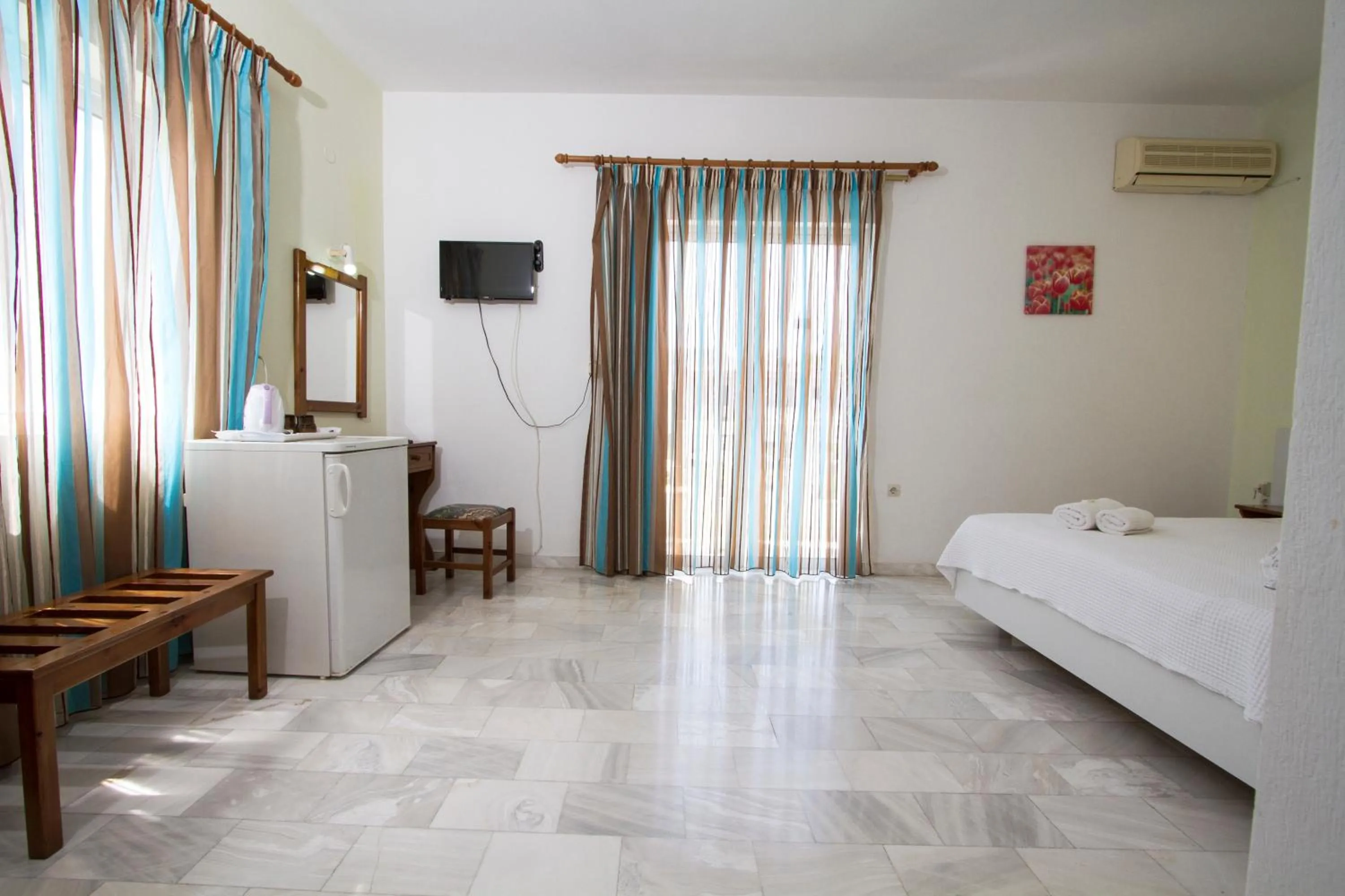 Bedroom in Revekka Rooms