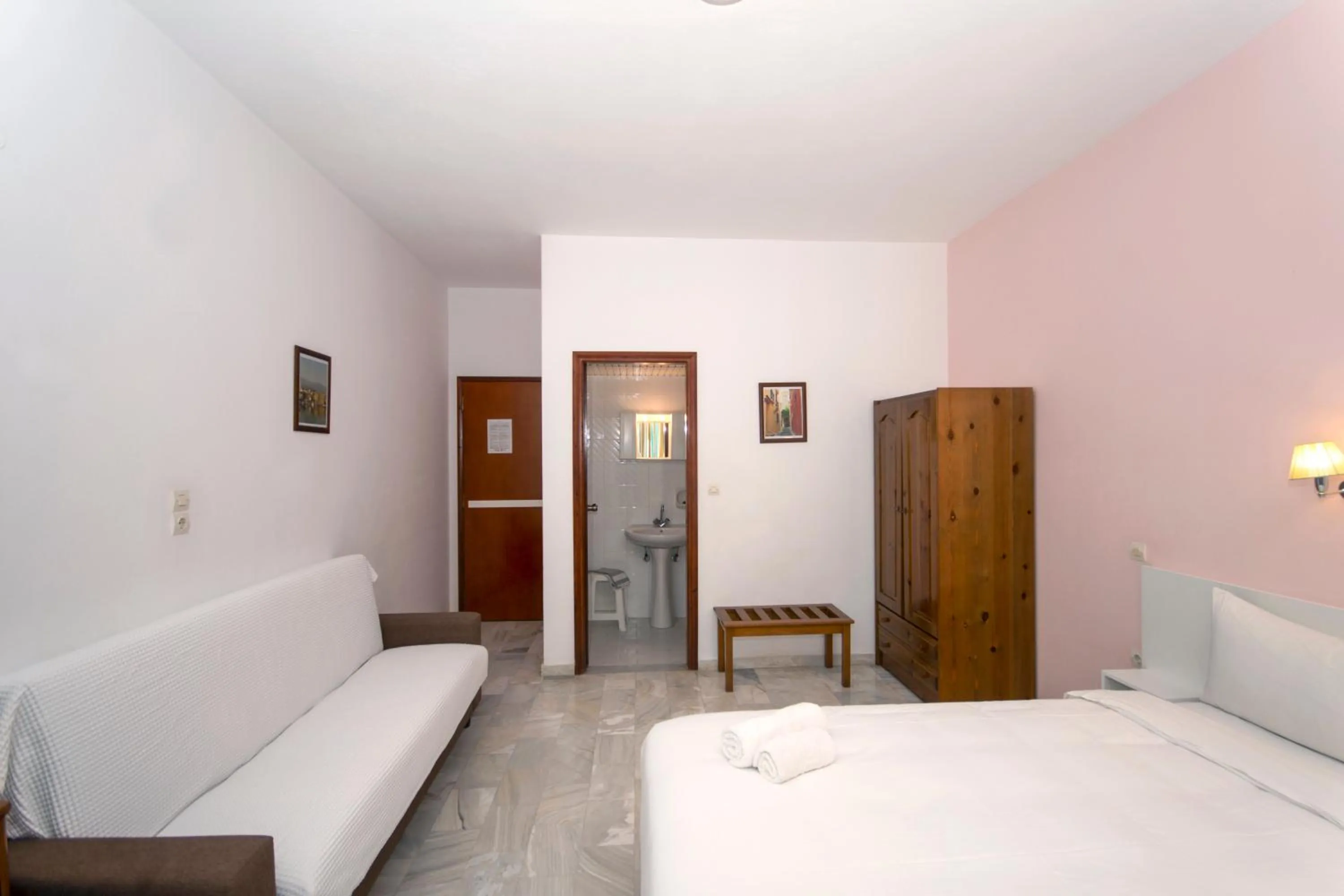 Bed in Revekka Rooms