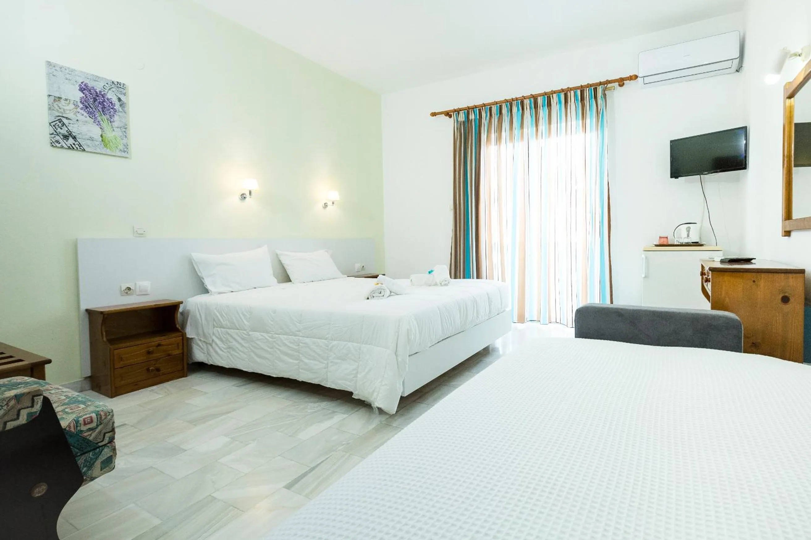 Bedroom in Revekka Rooms