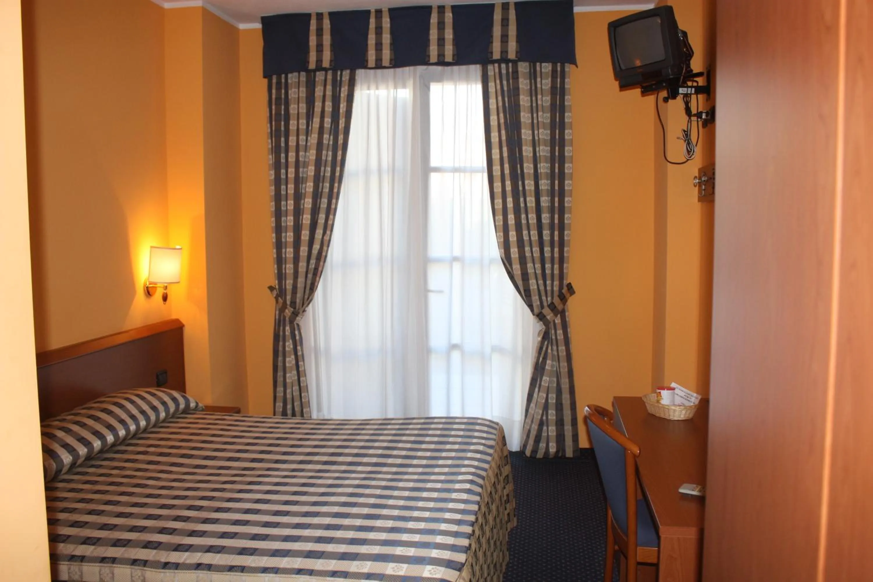 Bed in Hotel Tre Denti