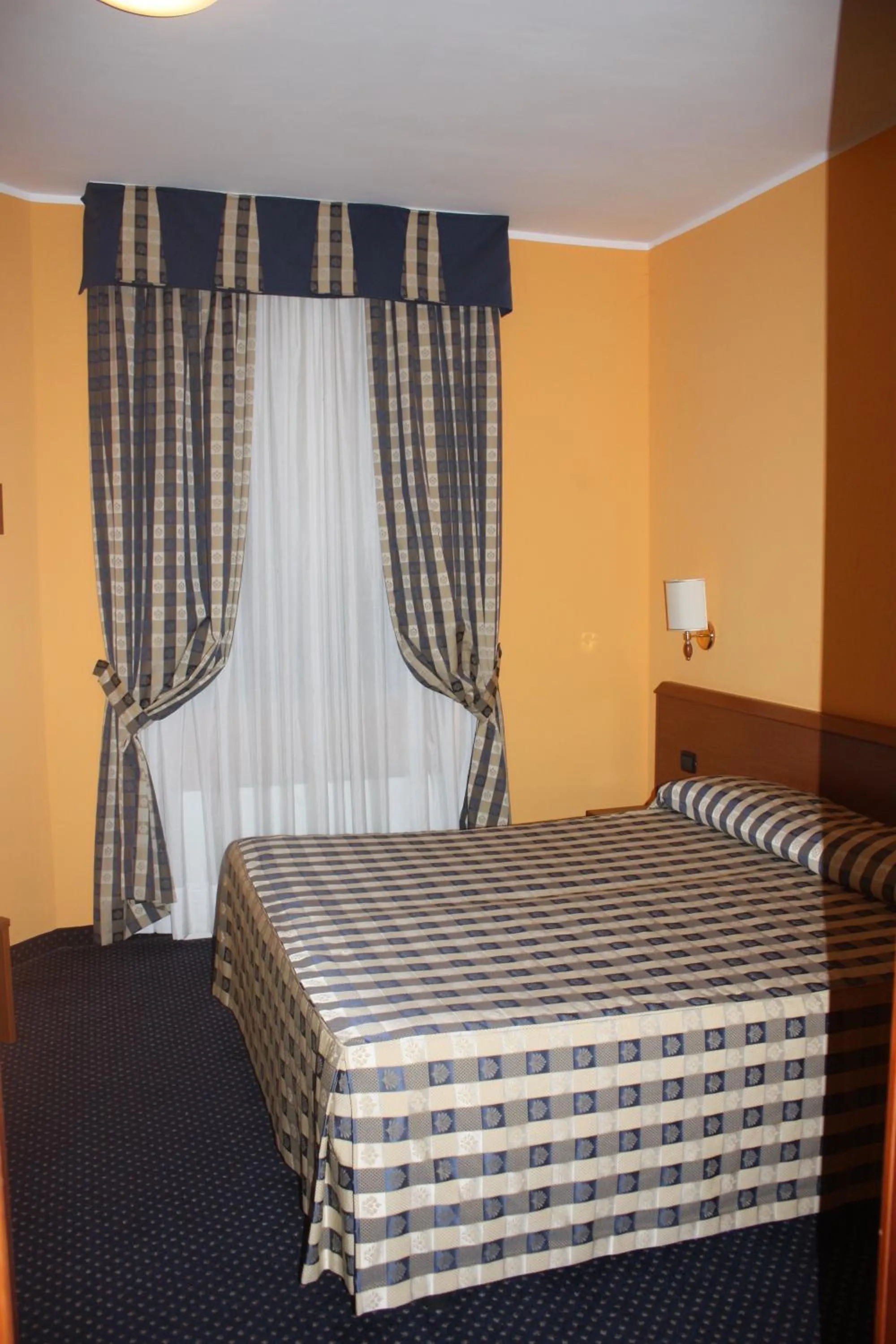 Bed in Hotel Tre Denti