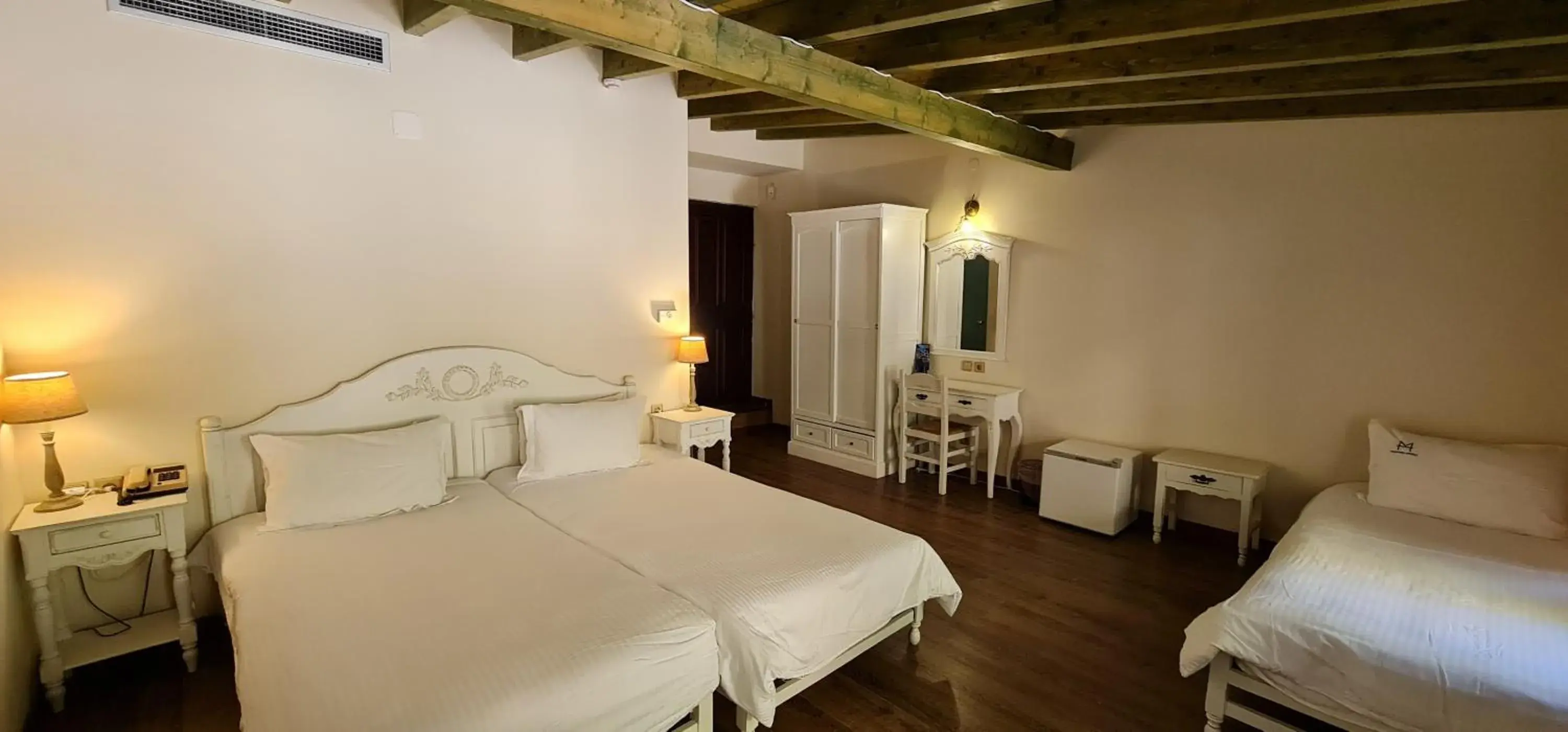 Standard Triple Room in Manthos Mountain Resort & Spa Standard Triple Room in Manthos Mountain Resort & Spa