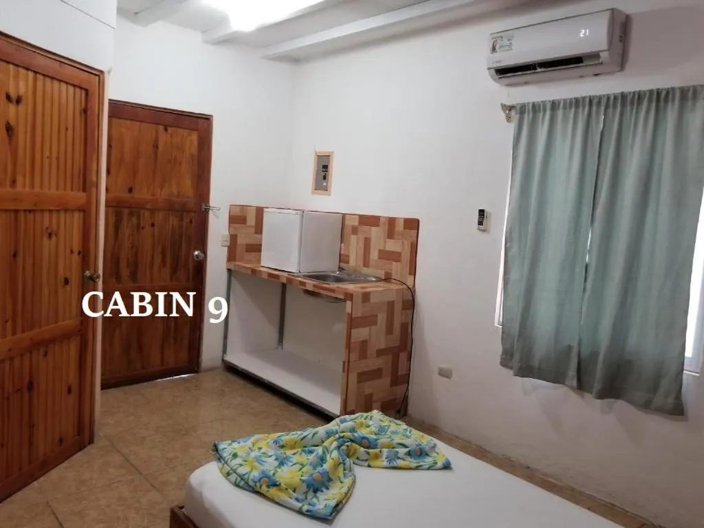 Bed in Mapi's Cabins