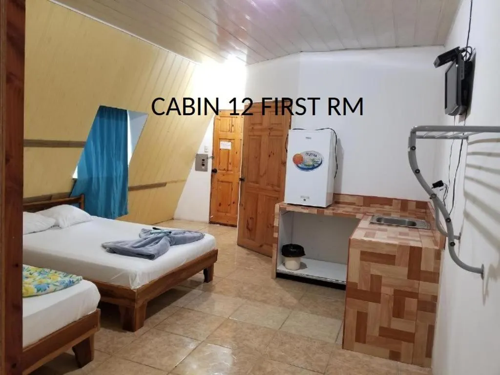 Bed in Mapi's Cabins