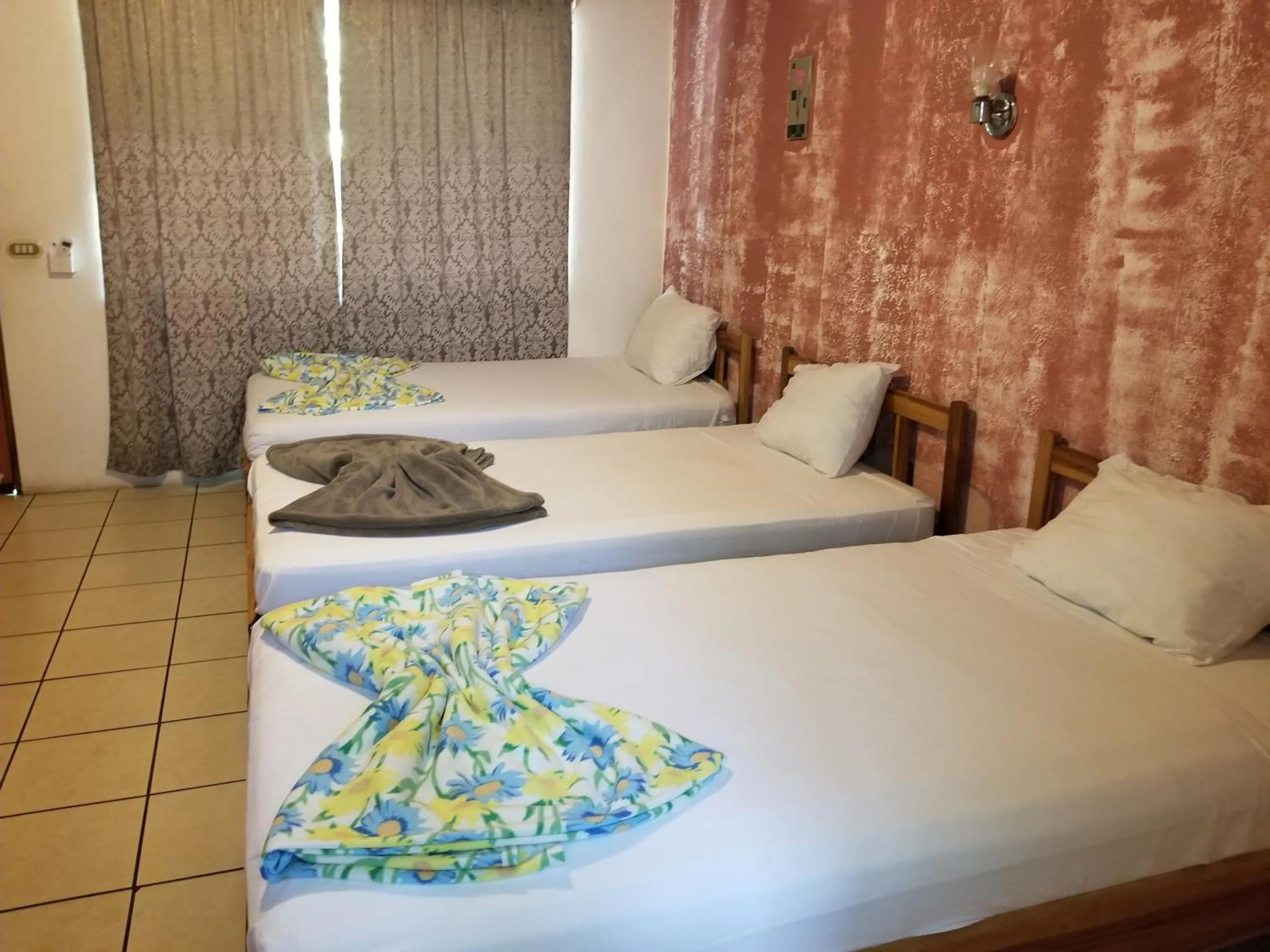 Bed in Mapi's Cabins