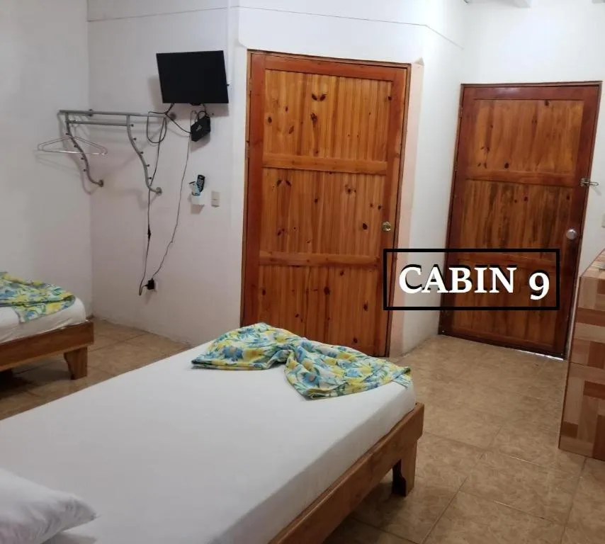 Bed in Mapi's Cabins