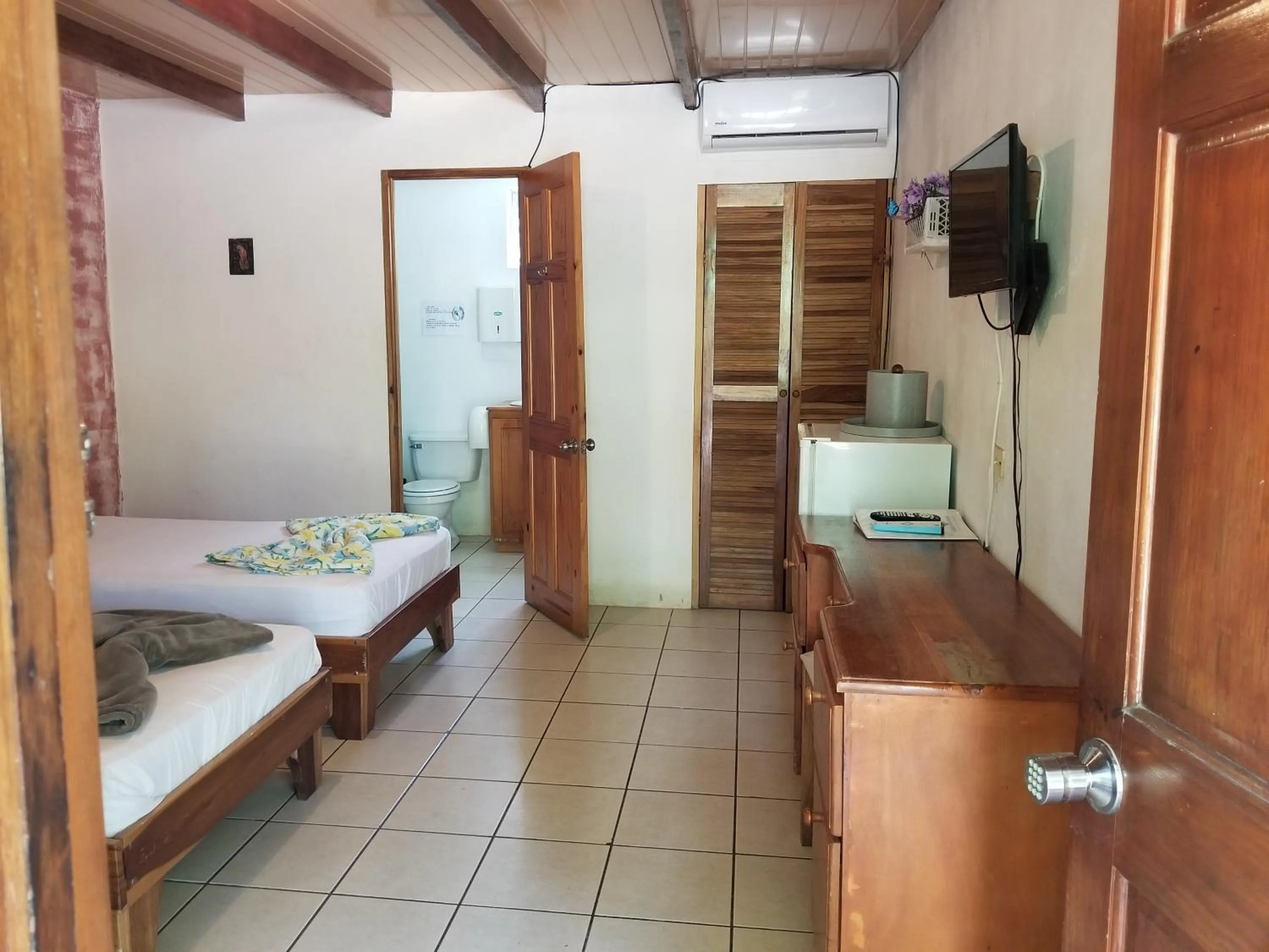 Bed in Mapi's Cabins