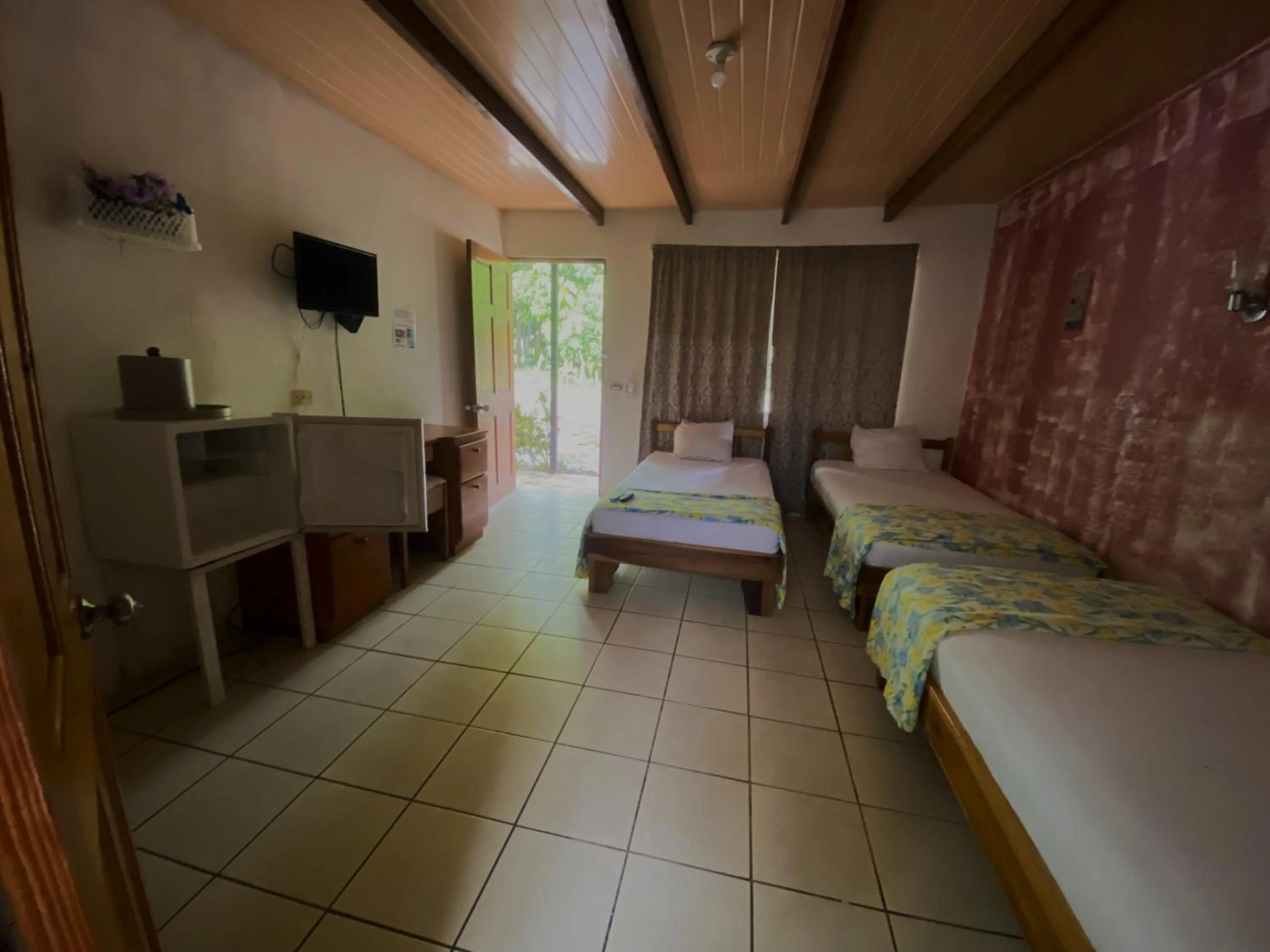 Bed in Mapi's Cabins