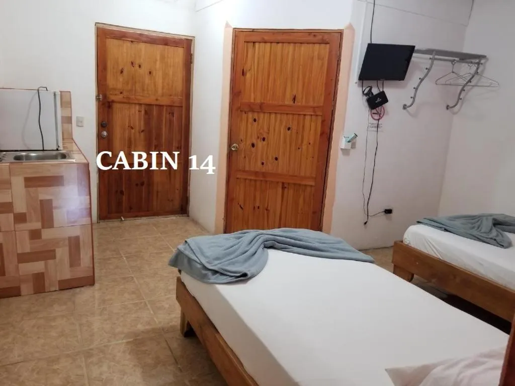 Bed in Mapi's Cabins