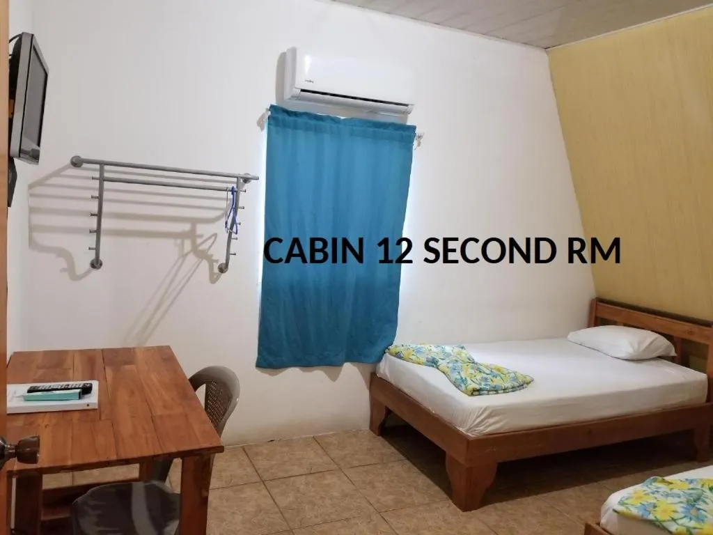 Bed in Mapi's Cabins