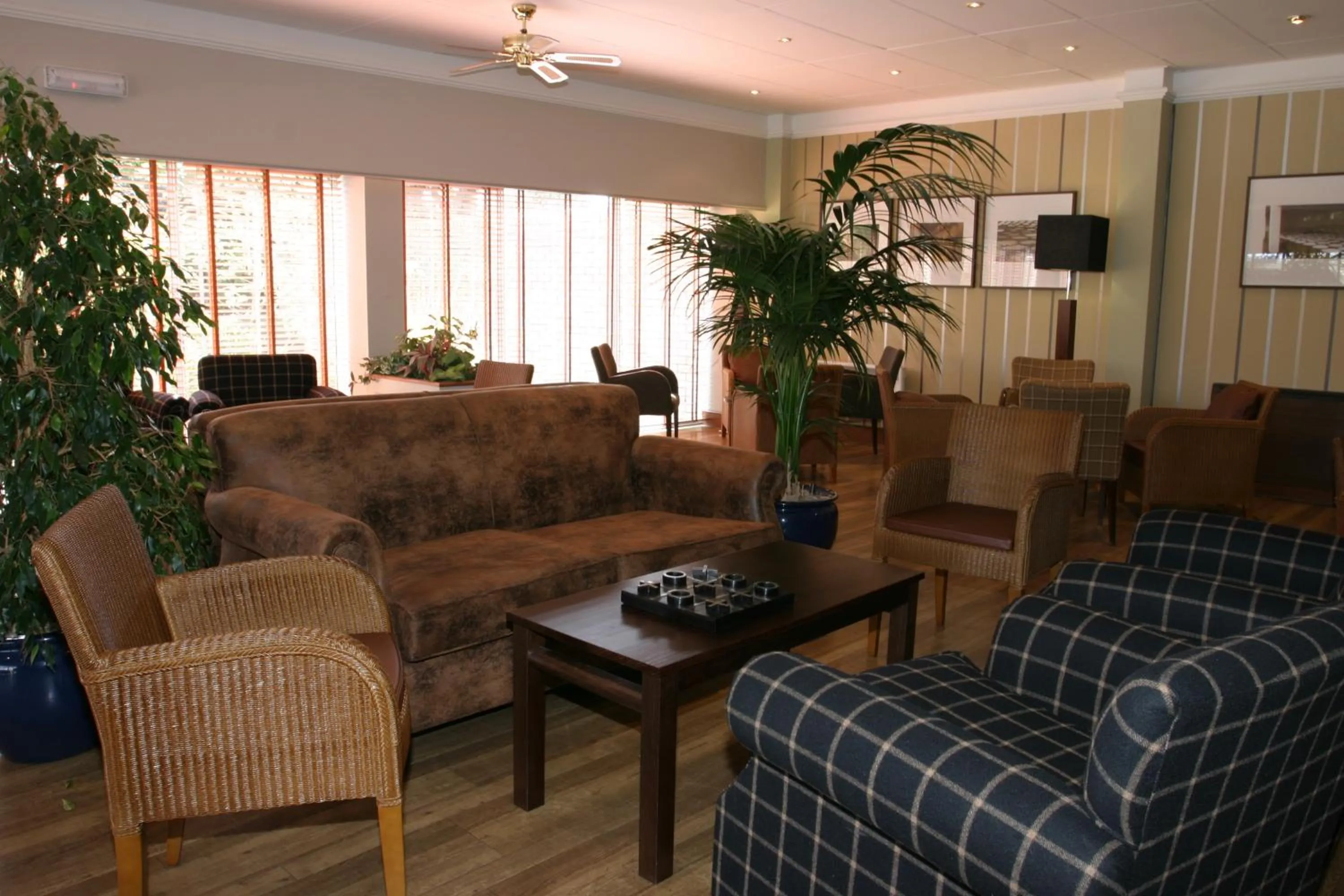 Lounge or bar in Eight Acres Hotel
