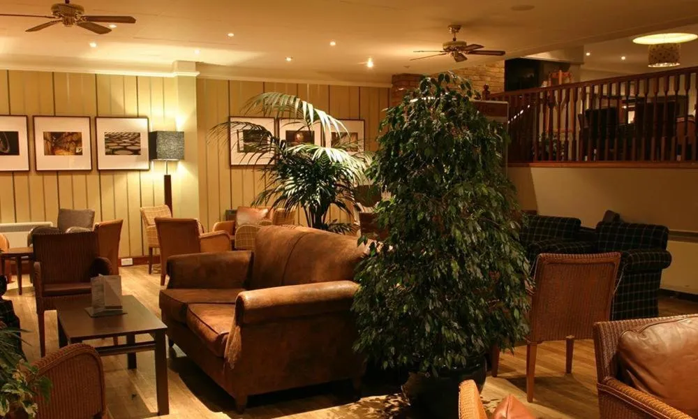 Lounge or bar in Eight Acres Hotel