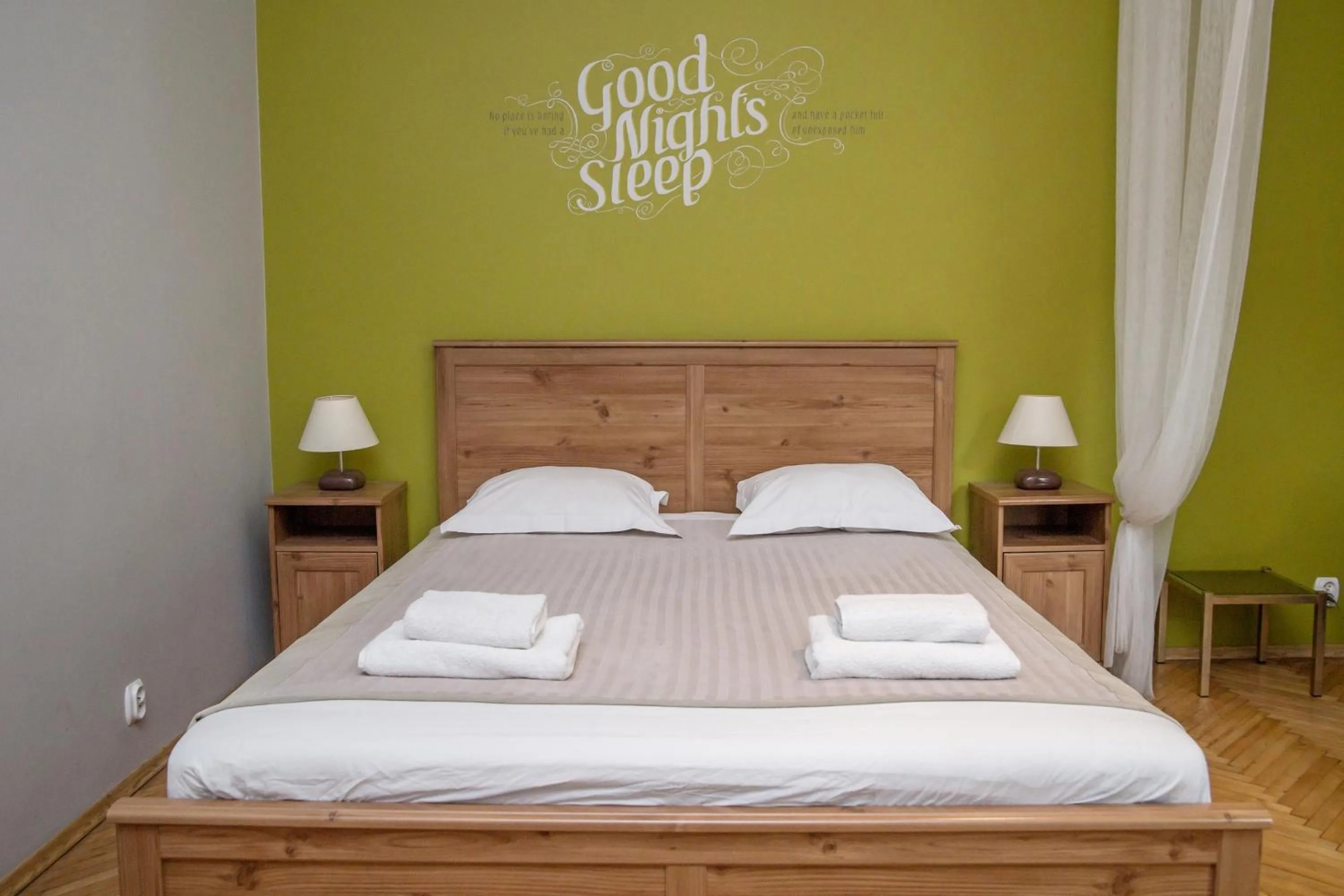 Bed in Red Kurka Apartments