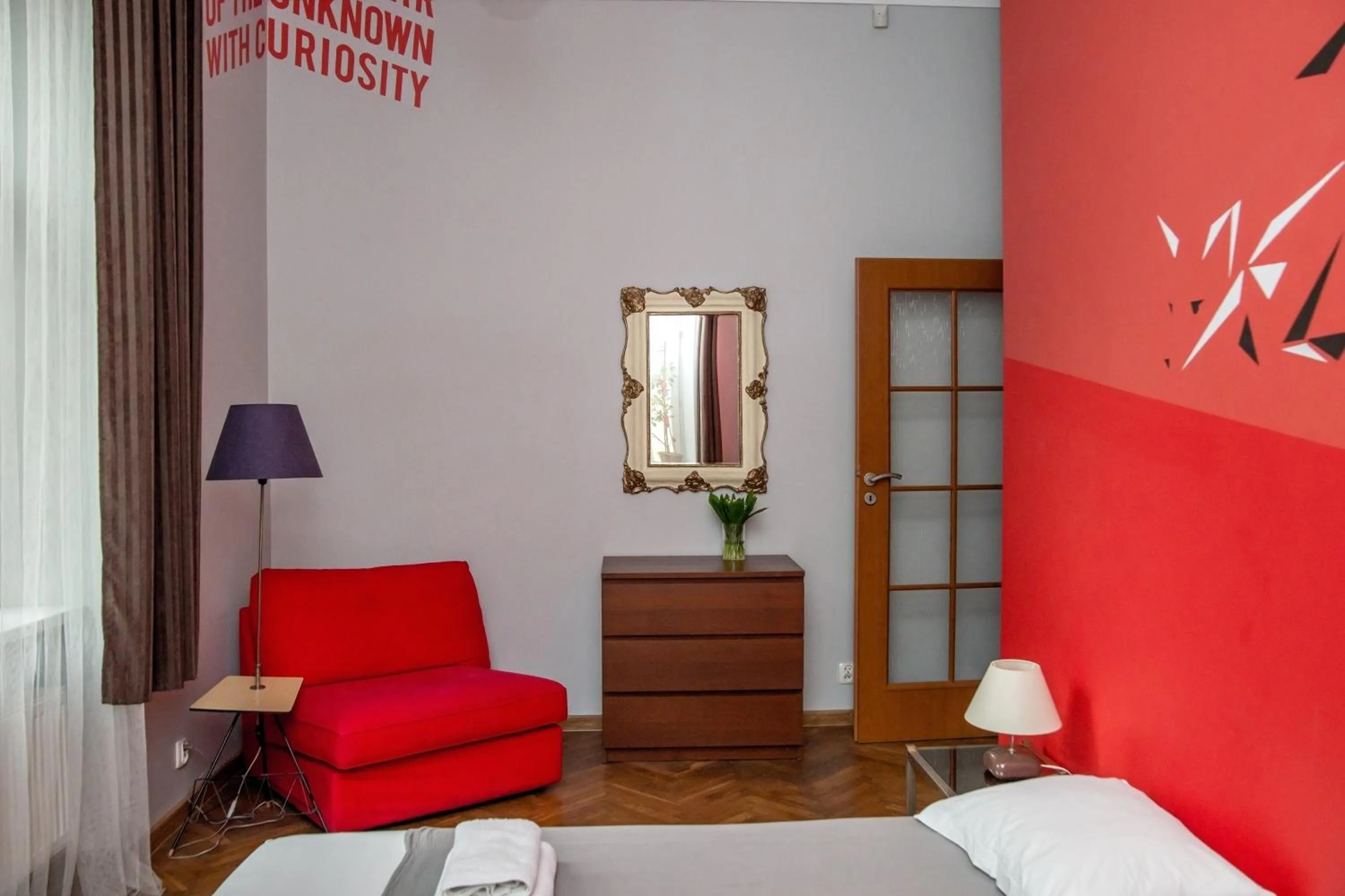 Bed in Red Kurka Apartments
