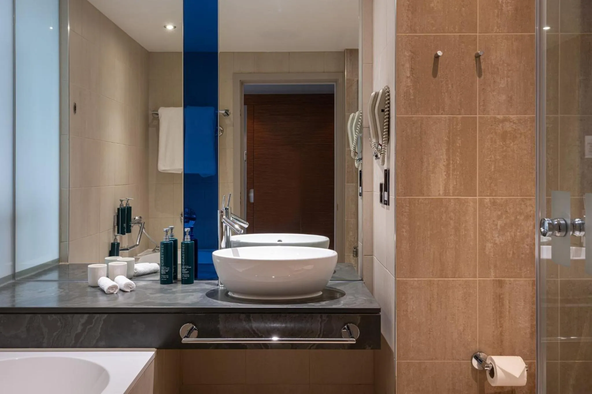 Bathroom in The Manchester Deansgate Hotel, by IHG