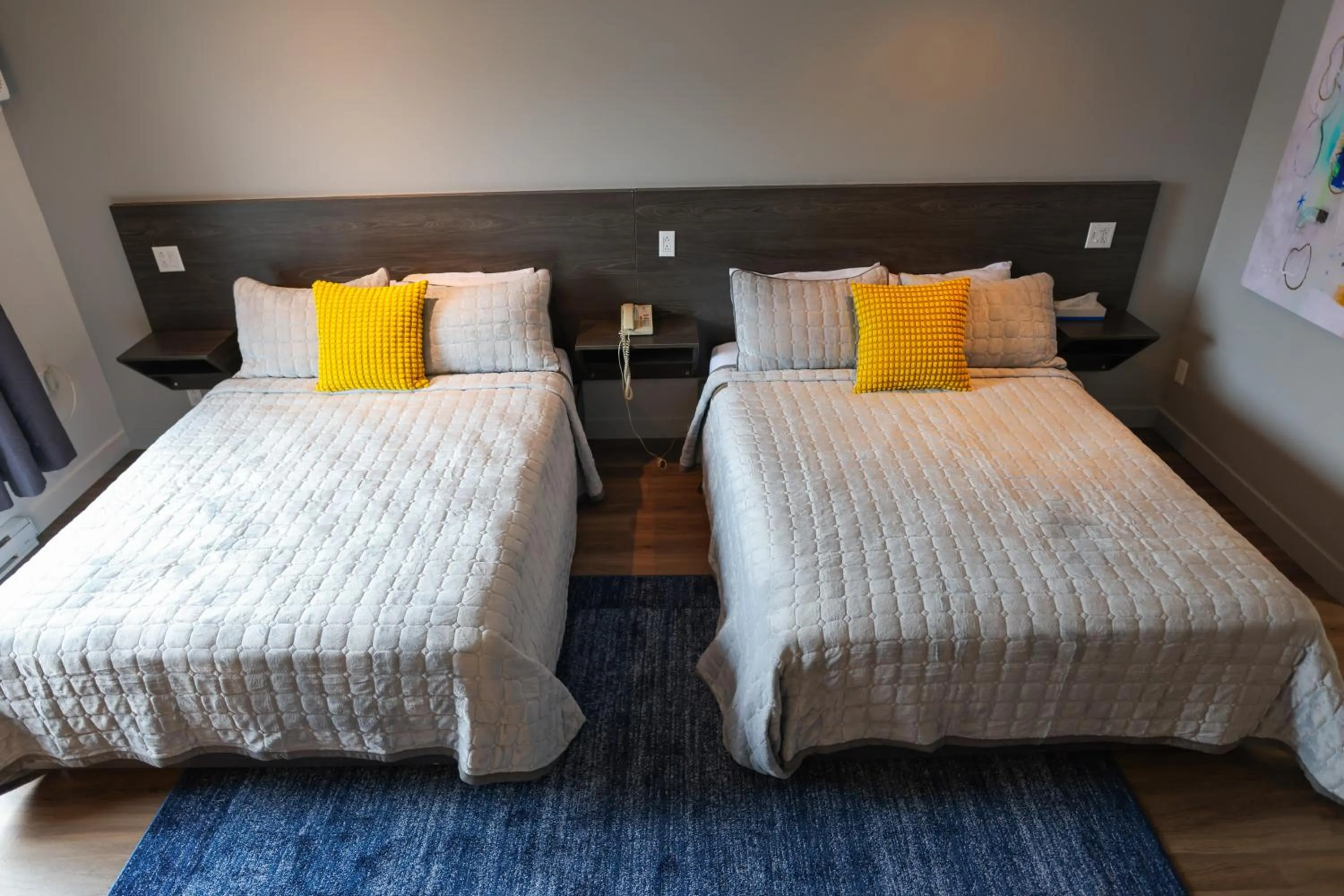 Bed in Le Fabreville Motel & Suites