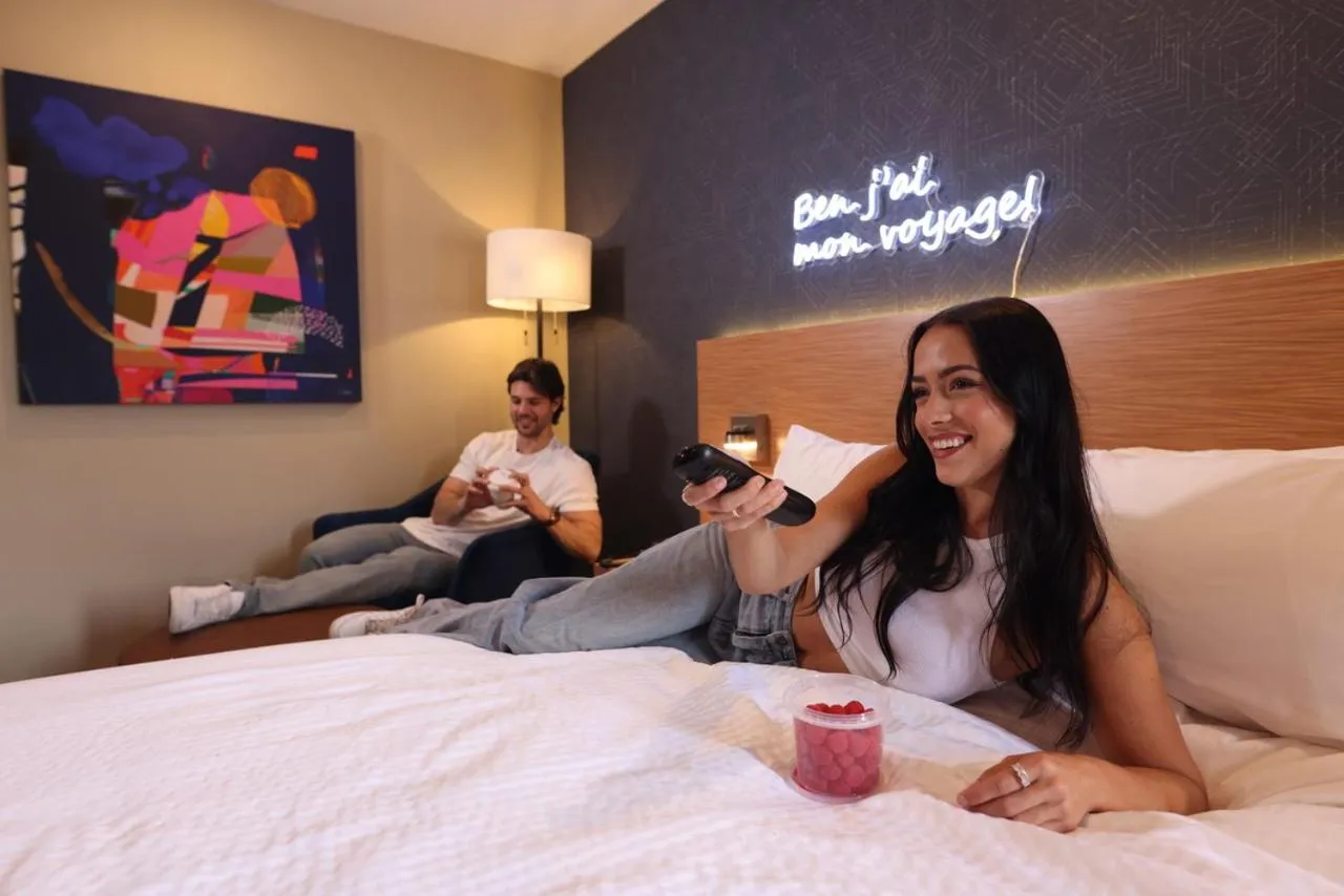 Bed in Le Fabreville Motel & Suites