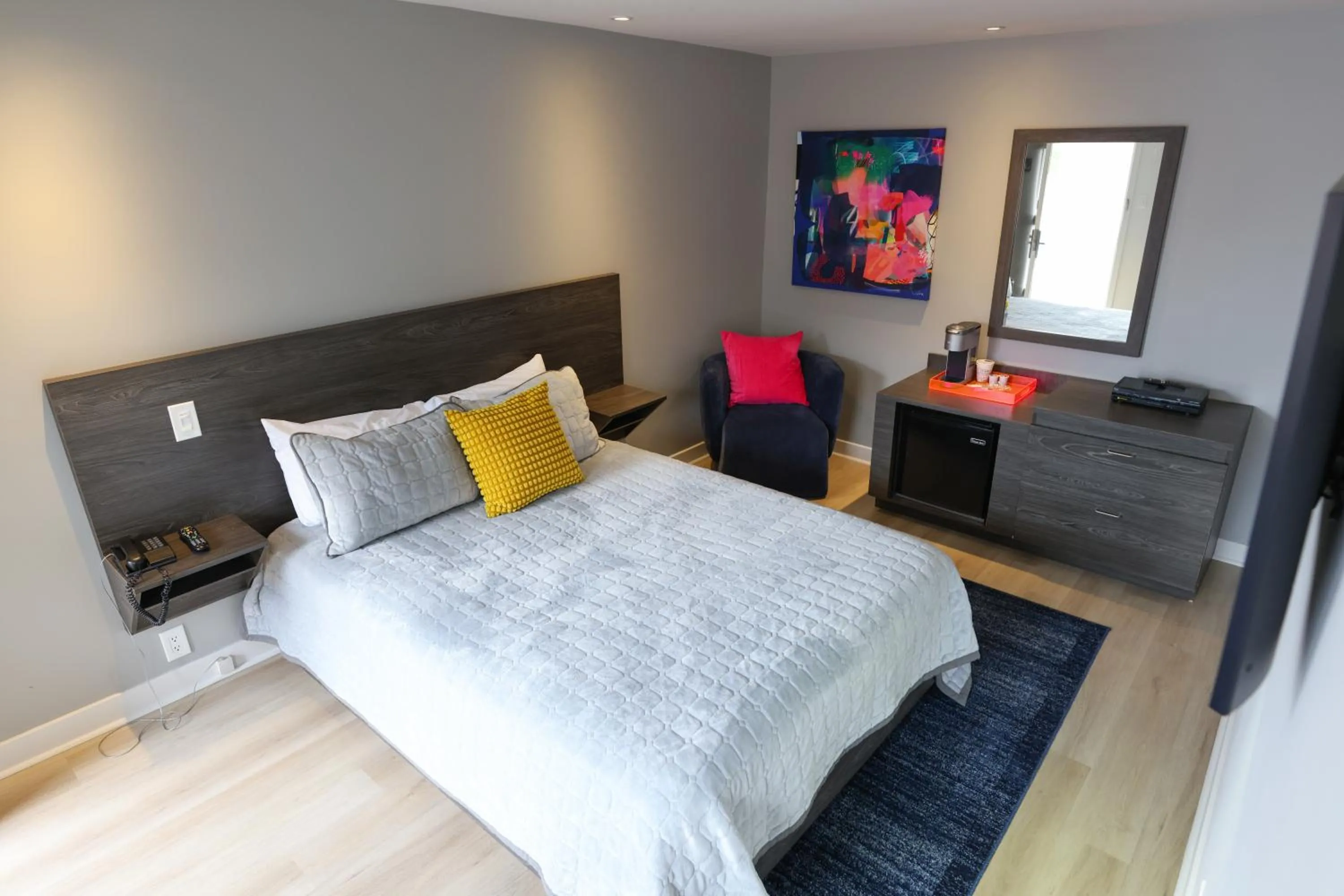 Bed in Le Fabreville Motel & Suites