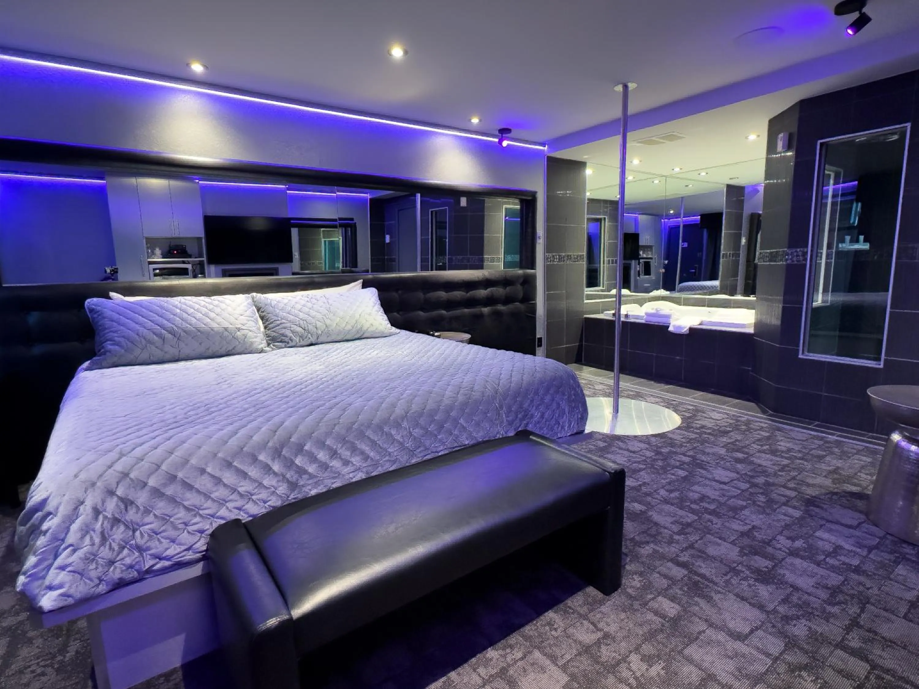 Bed in Le Fabreville Motel & Suites