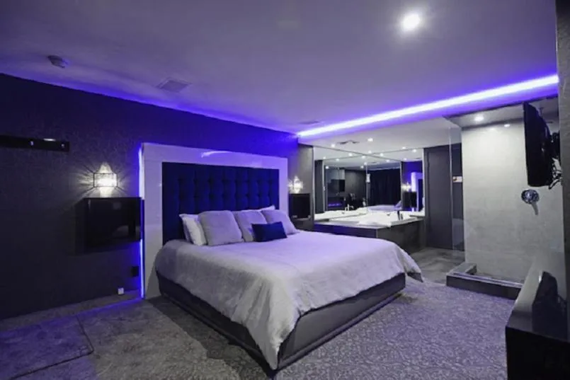 Bed in Le Fabreville Motel & Suites