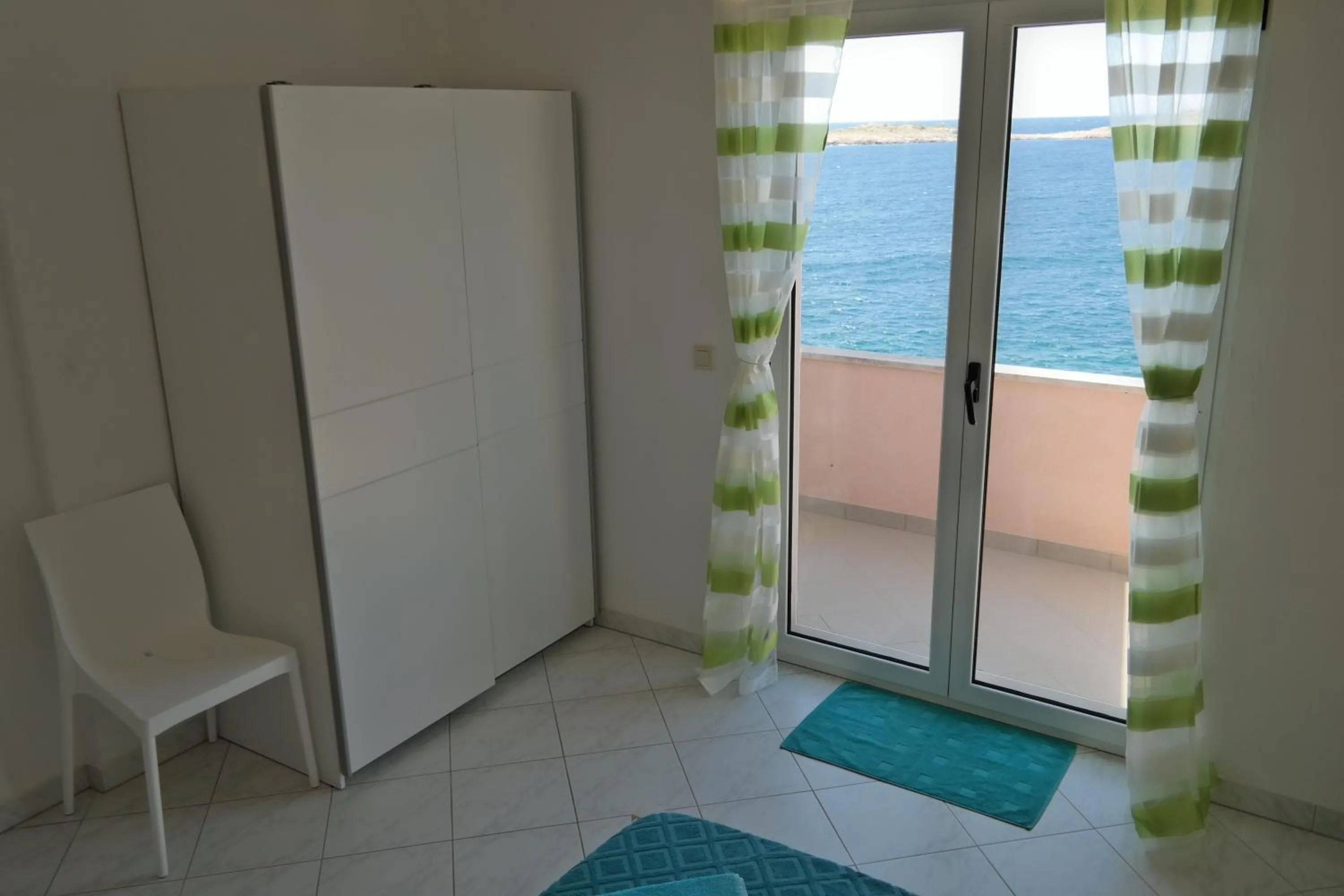 Bedroom in Direkt am Meer-Apartments Puntaplanka