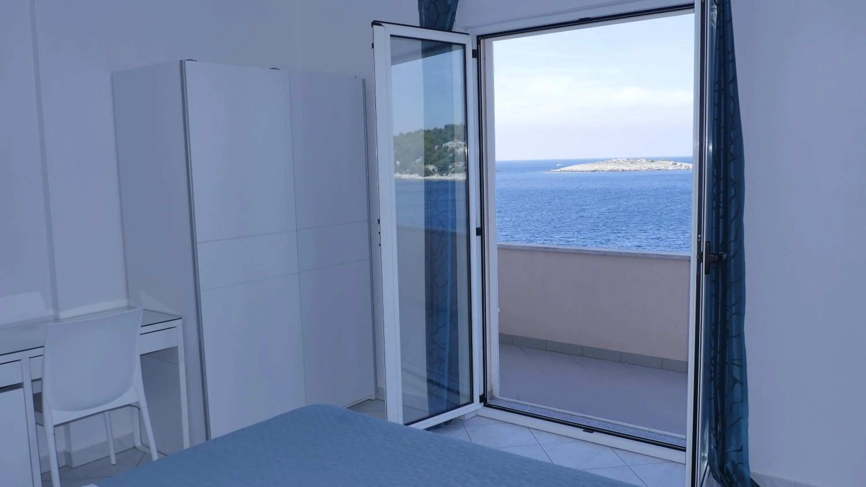 Bedroom in Direkt am Meer-Apartments Puntaplanka